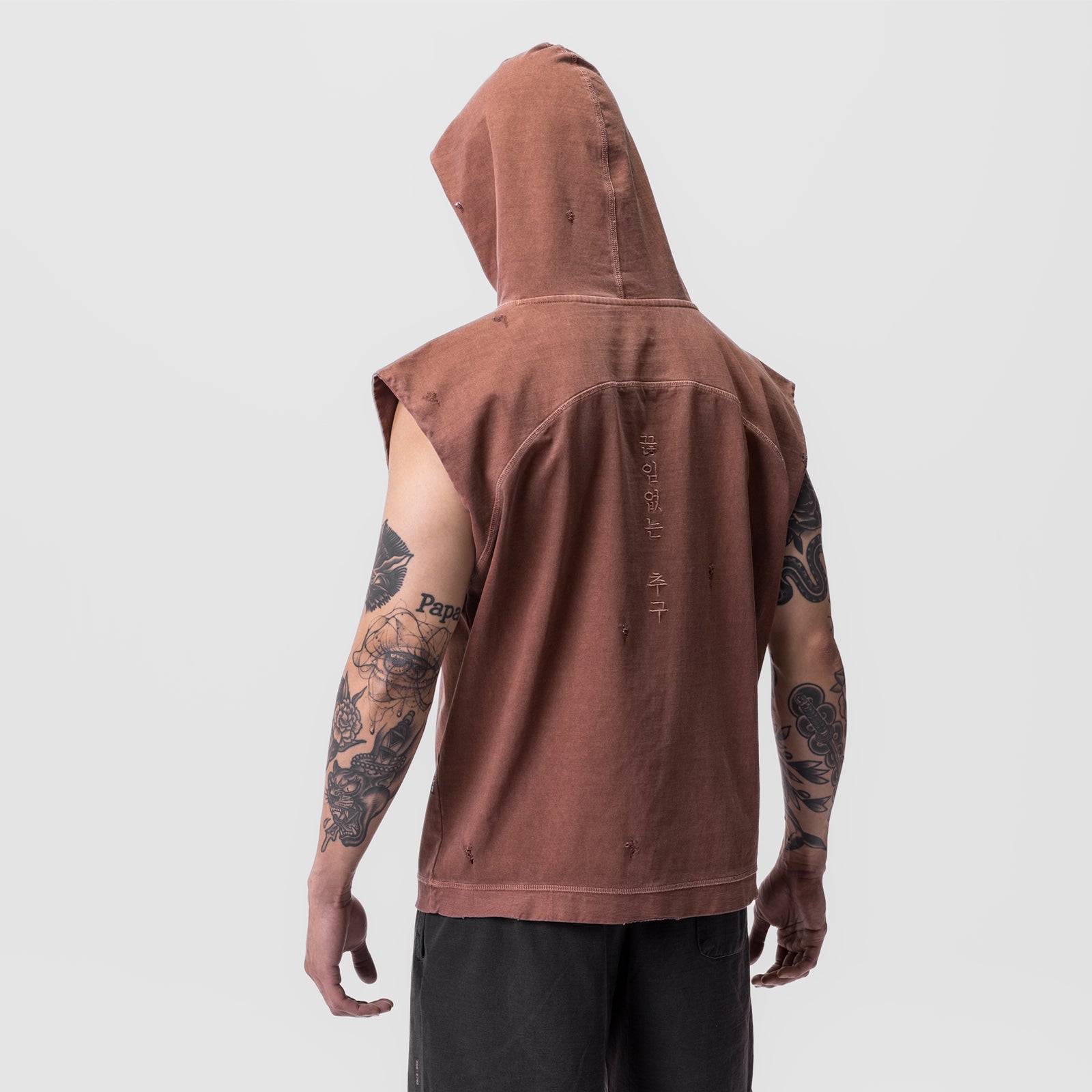 Tech Essential Cutoff Hoodie in Faded Brick, rear view on model