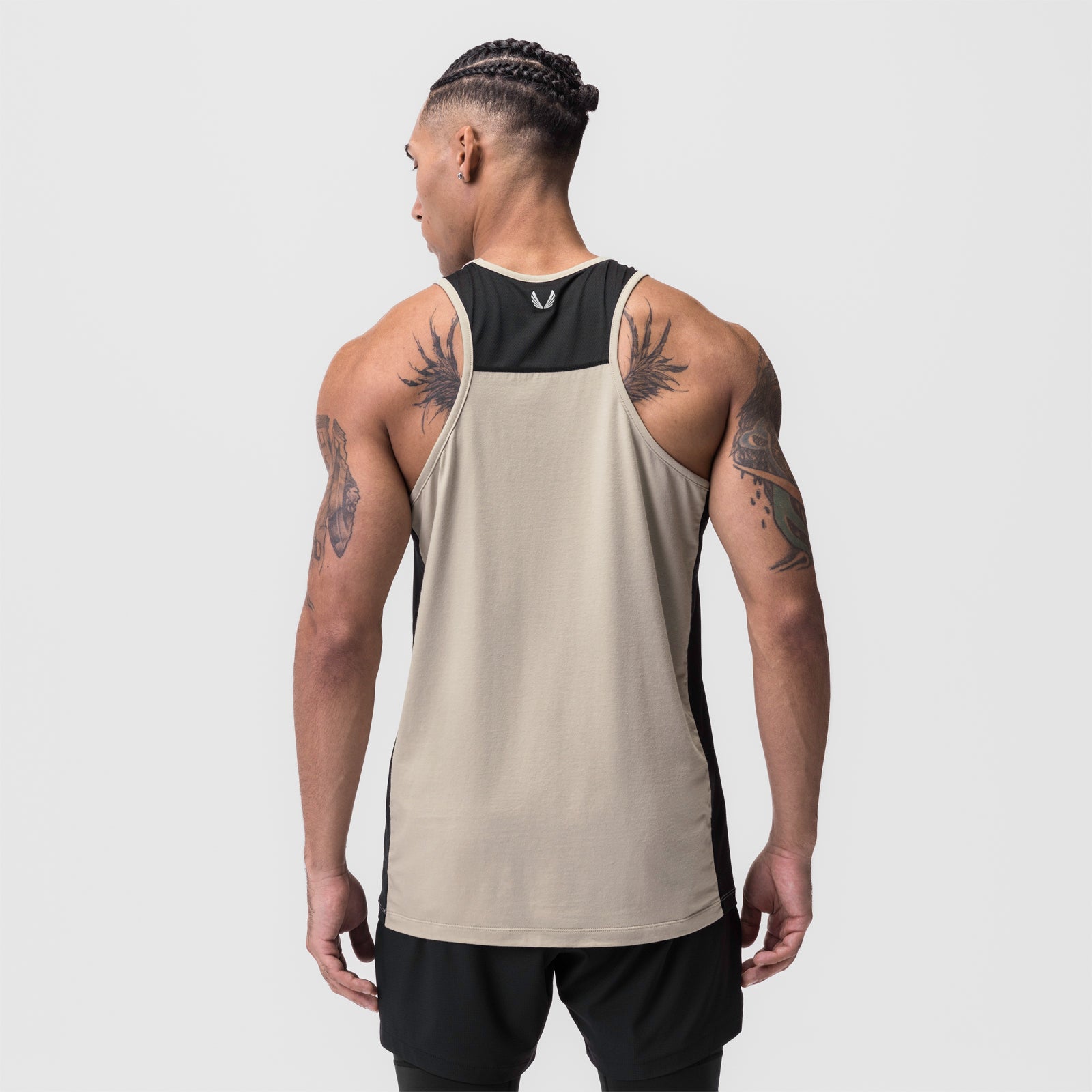 Supima® Mesh Panel Training Singlet in sand and black, worn by model, back view