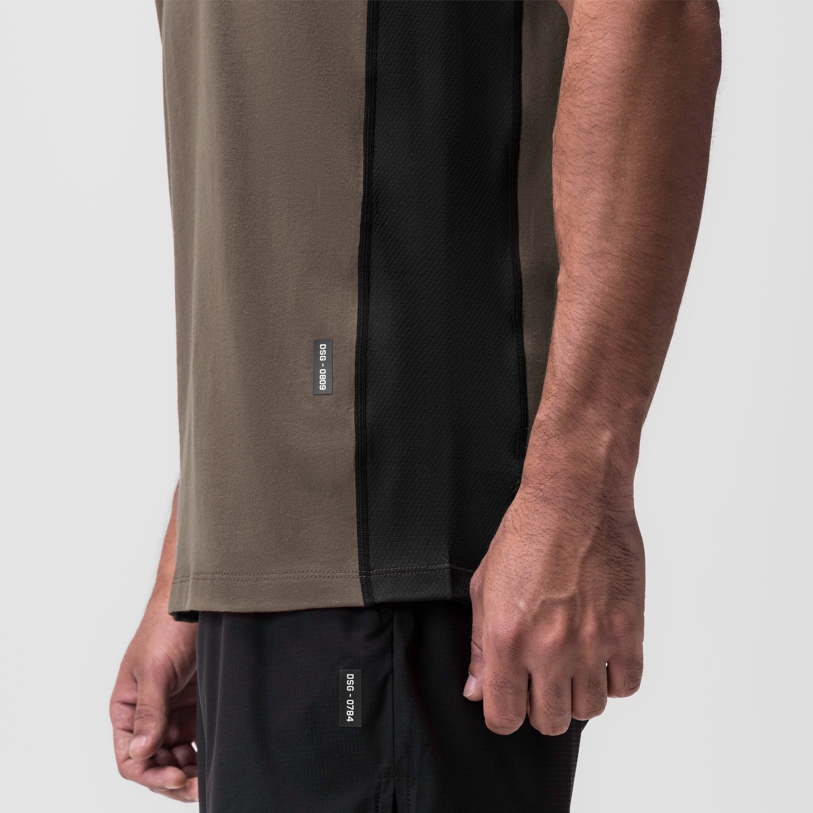 Supima® Mesh Panel Training Singlet in deep taupe and black, worn by model showing side detail