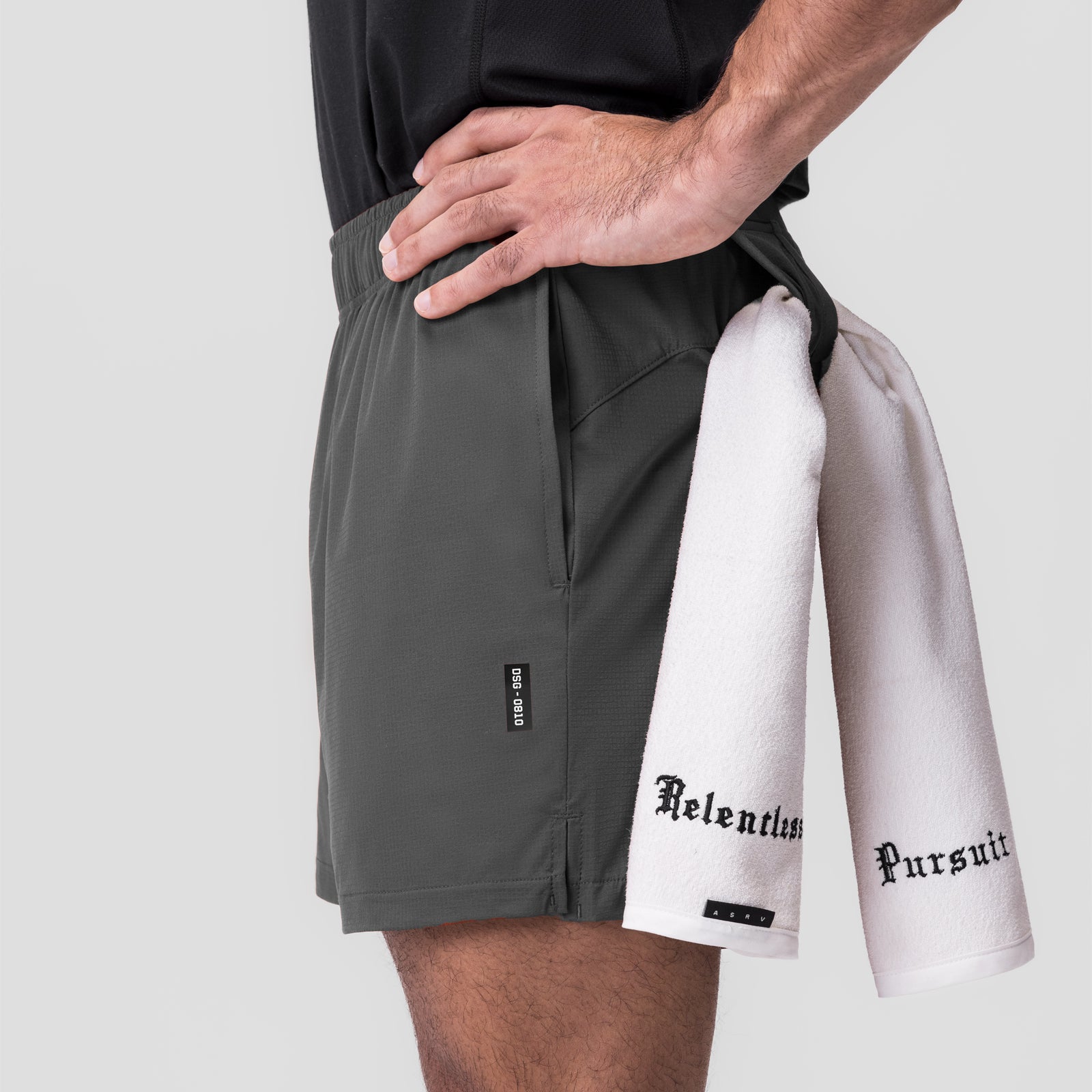 Raven 0810 Ultralite 6" Linerless Shorts worn by model holding white towel with text