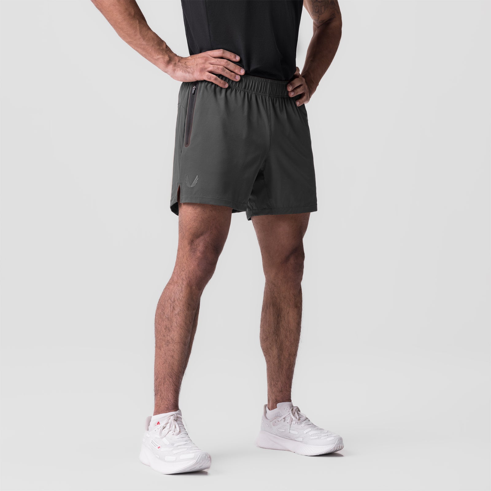 Ultralite 6" Linerless Short in Raven, worn by model standing against white background