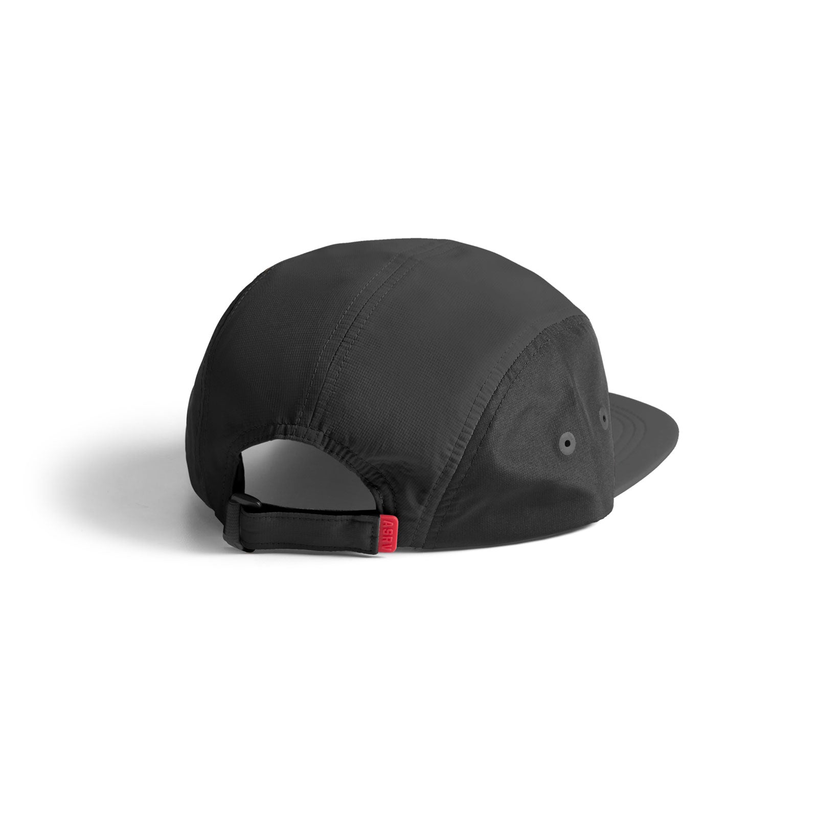 flatlay of black 5-panel run cap with back strap detail, rear view