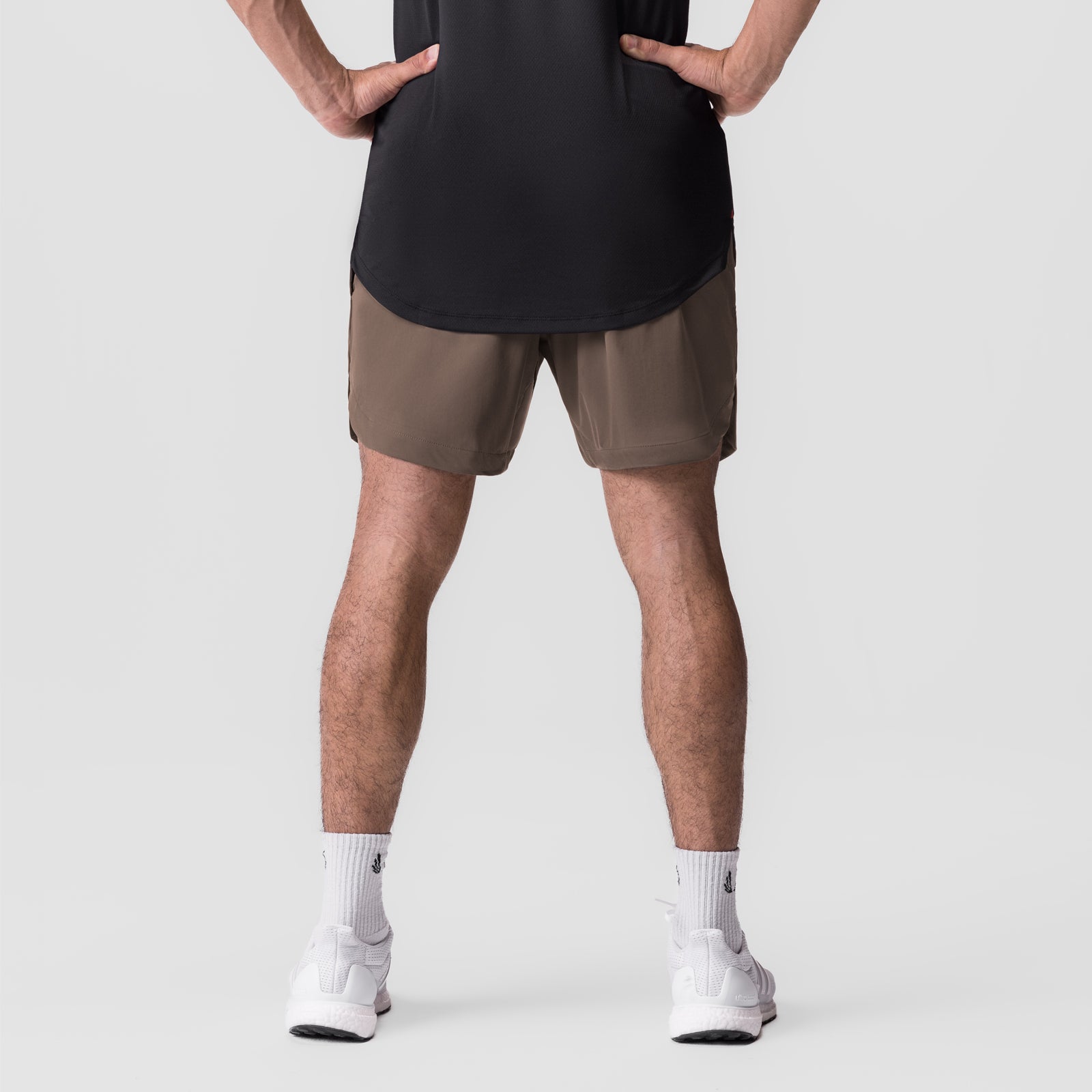 Tetra-Lite 7" Linerless Short in Deep Taupe, front view on model with white socks