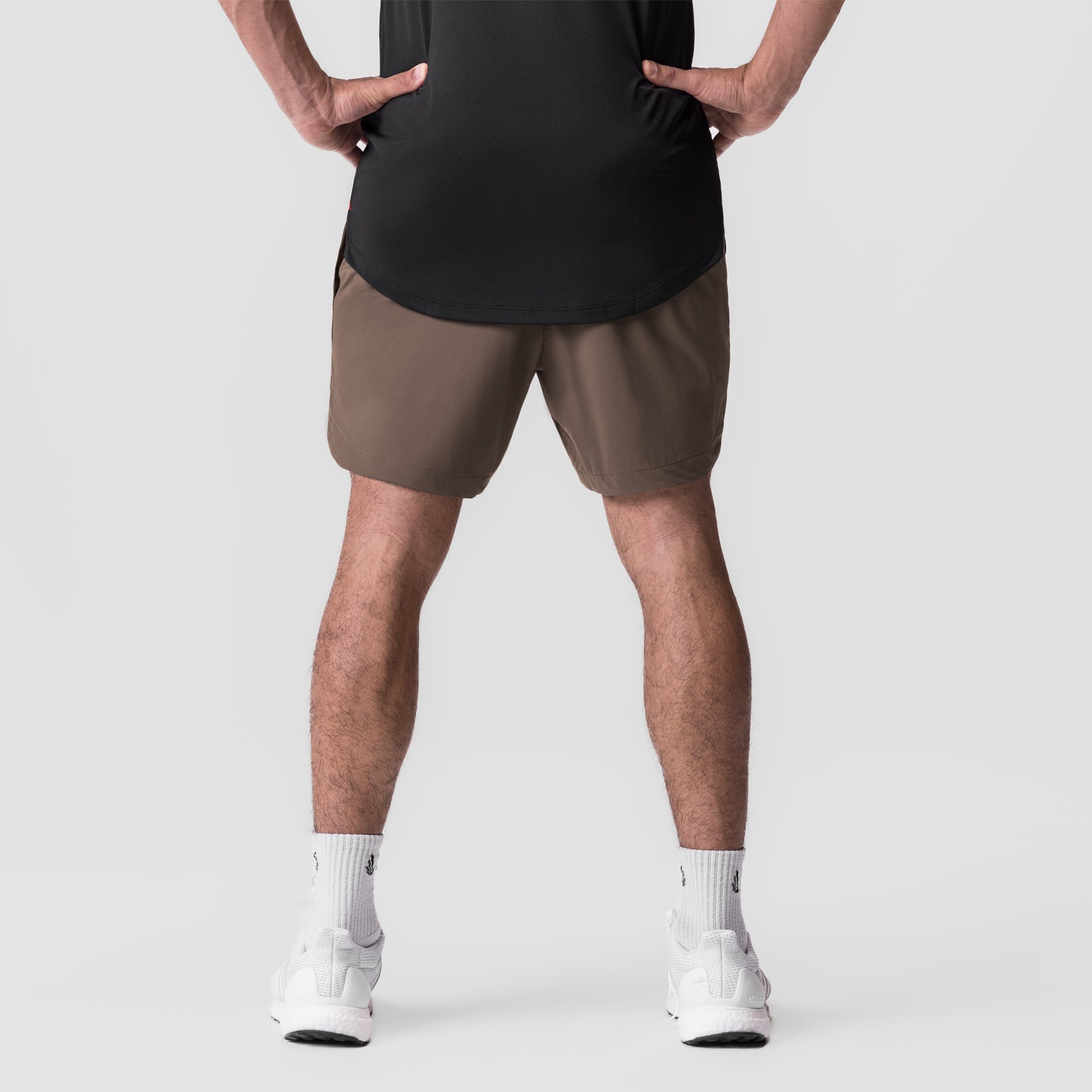 Tetra-Lite 7" Linerless Short in Deep Taupe, front view on model