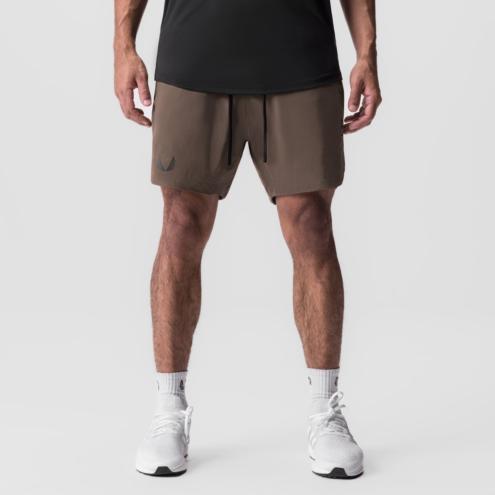 Tetra-Lite Linerless Short in deep taupe, front view on model