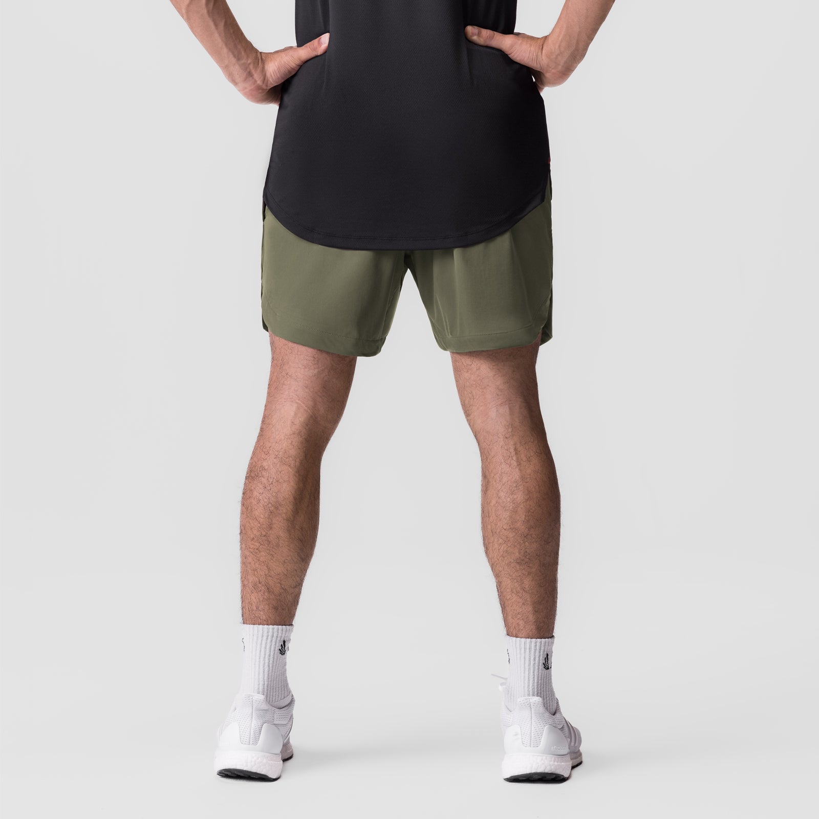 Tetra-Lite 7" Linerless Short in olive, front view on model