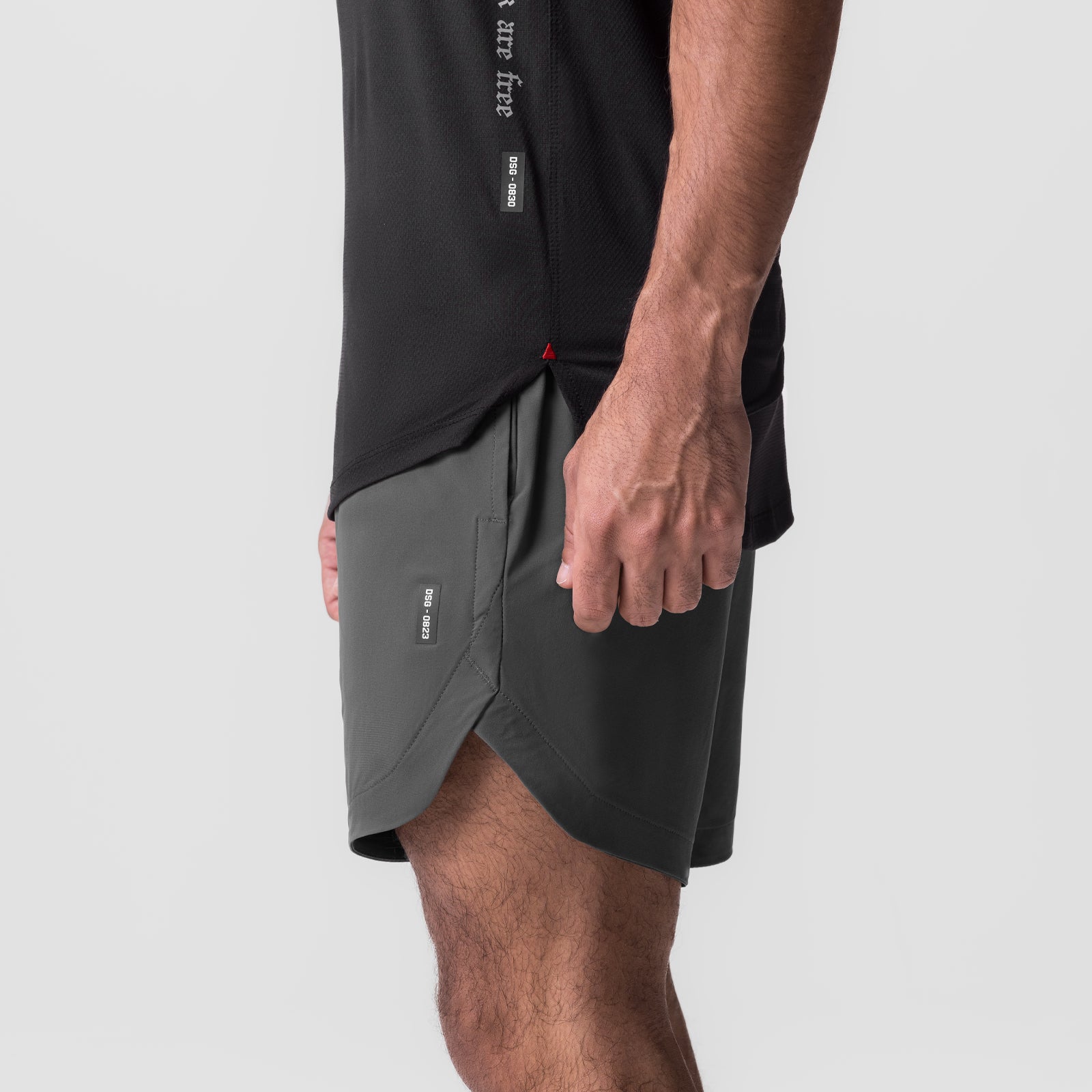 Tetra-Lite 7" Linerless Short in Raven, worn by model, side view