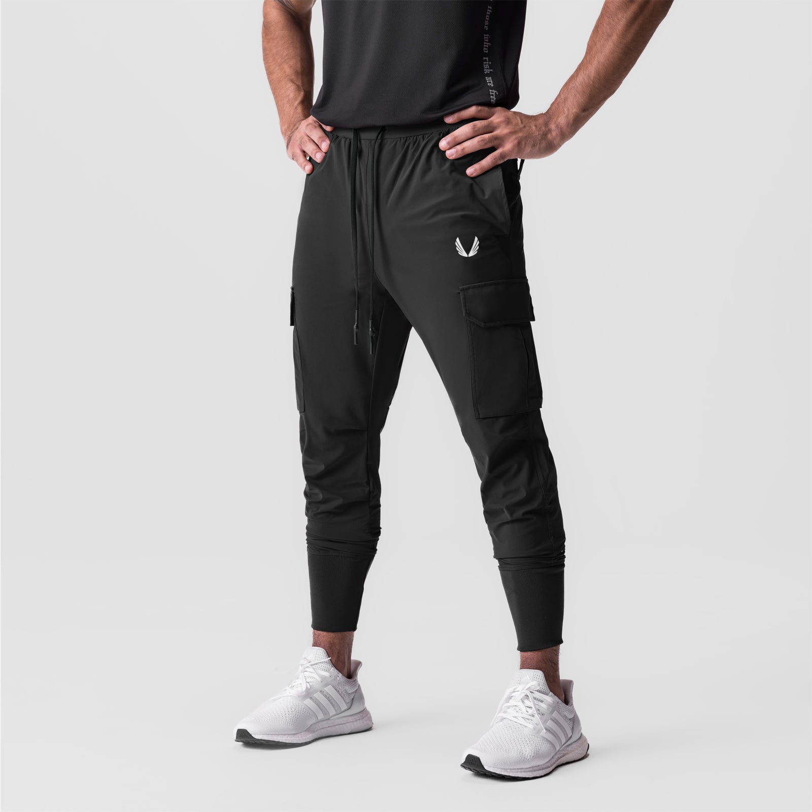 Tetra-Lite® Cargo High Rib Jogger in black with white wings logo, modeled from waist down