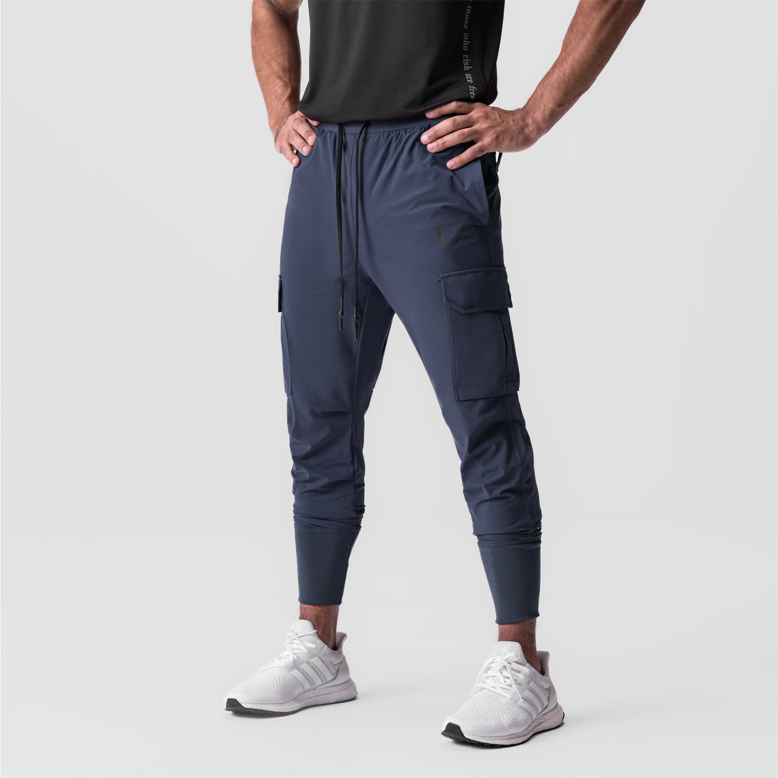 Tetra-Lite Cargo High Rib Jogger in navy worn by model, front view