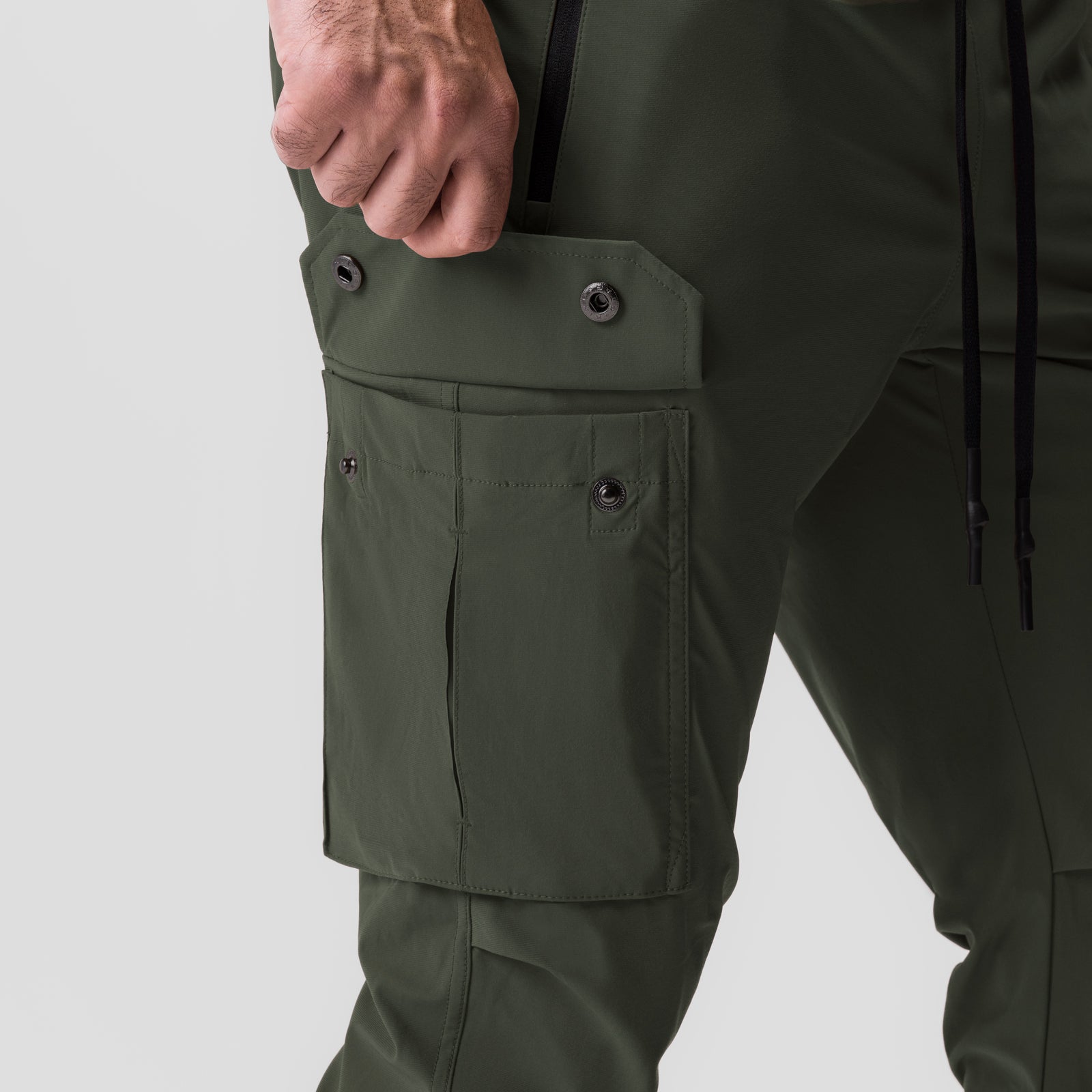 Tetra-Lite Cargo High Rib Jogger in olive, worn with cargo pocket detail visible