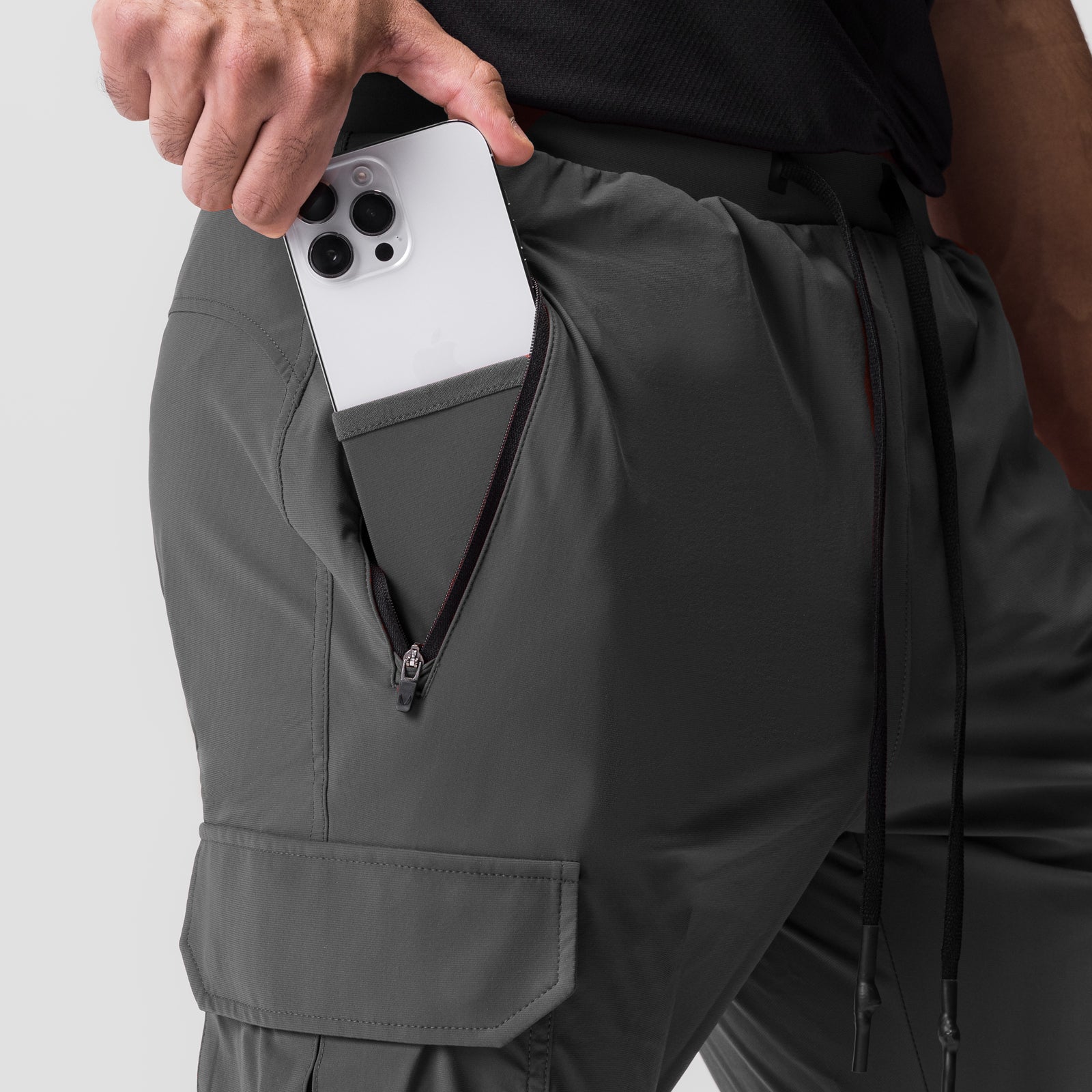 Tetra-Lite® Cargo High Rib Jogger in Space Grey, worn with phone in cargo pocket