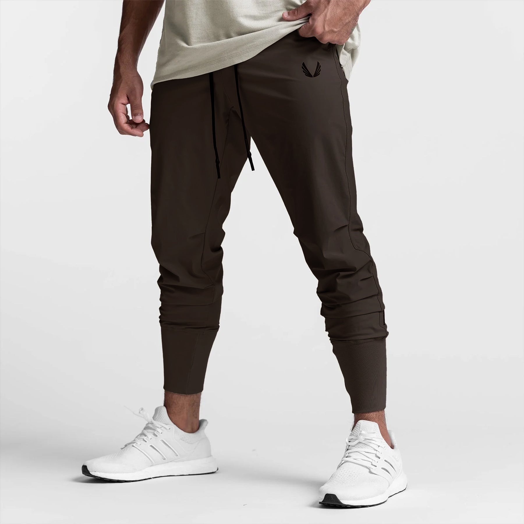 Tetra-Lite High Rib Jogger in dark earth worn by model, front view