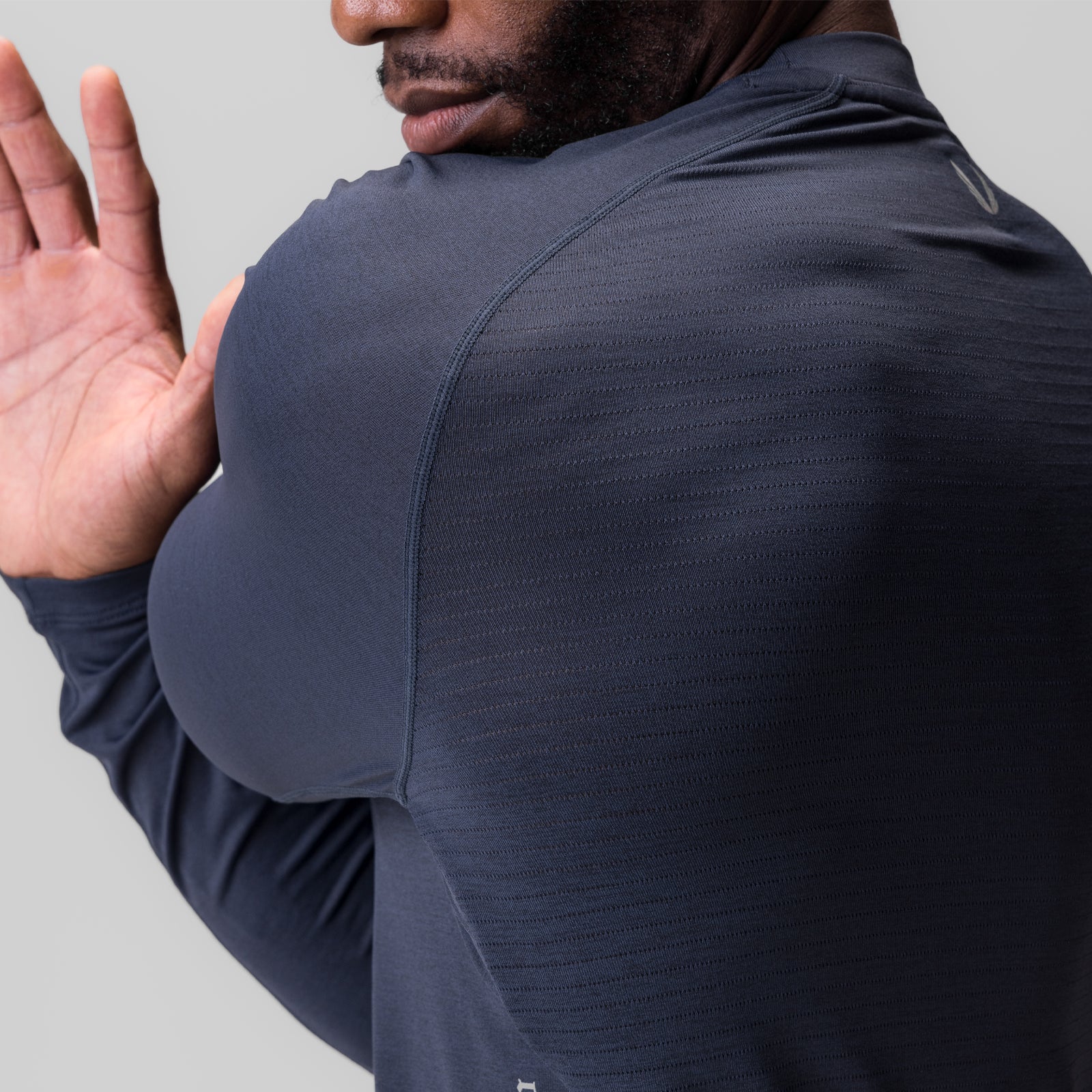 3D-Lite® 2.0 Fitted Long Sleeve in Navy, model wearing shirt with hand raised to shoulder