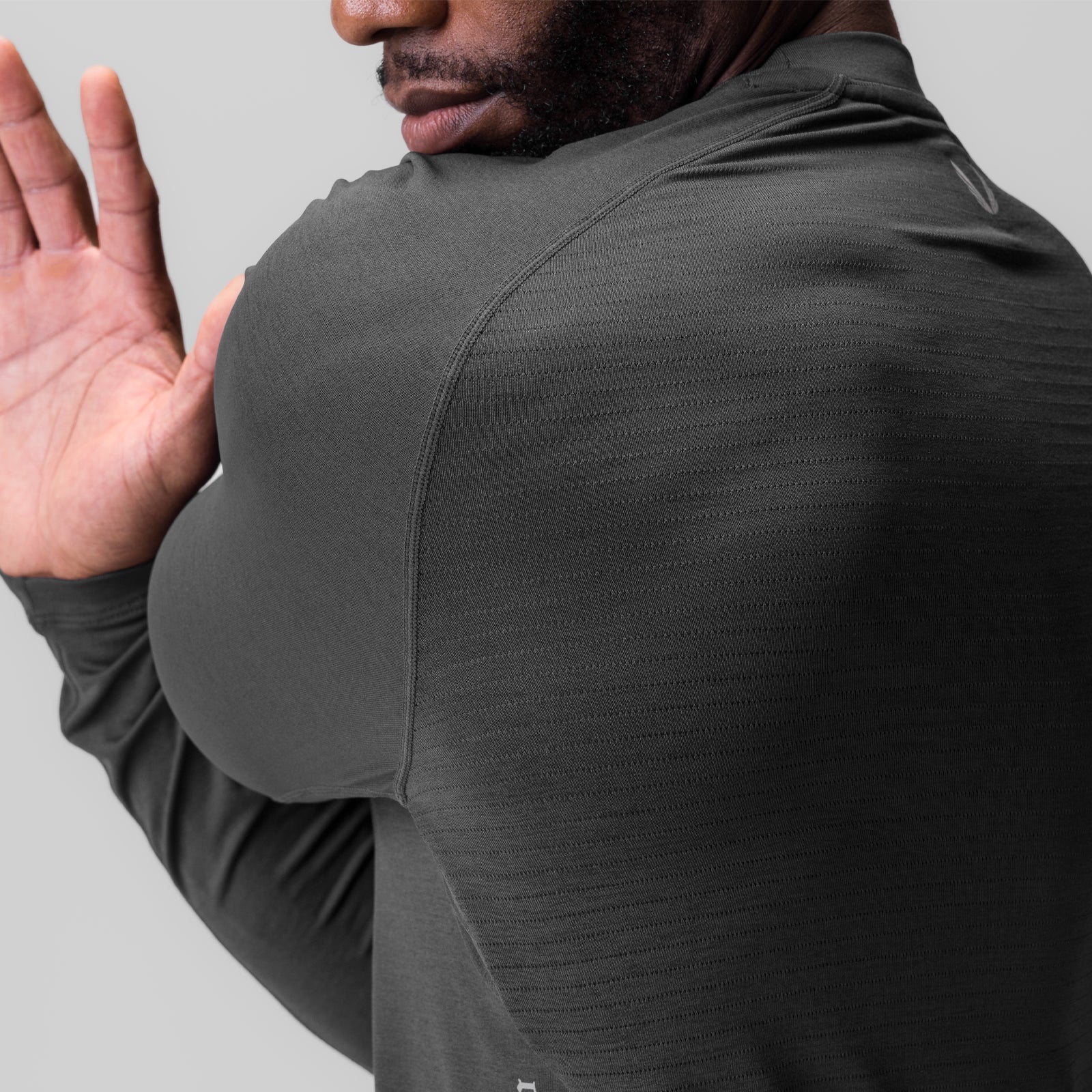 3D-Lite® 2.0 Fitted Long Sleeve in Space Grey worn by model from behind, hand raised