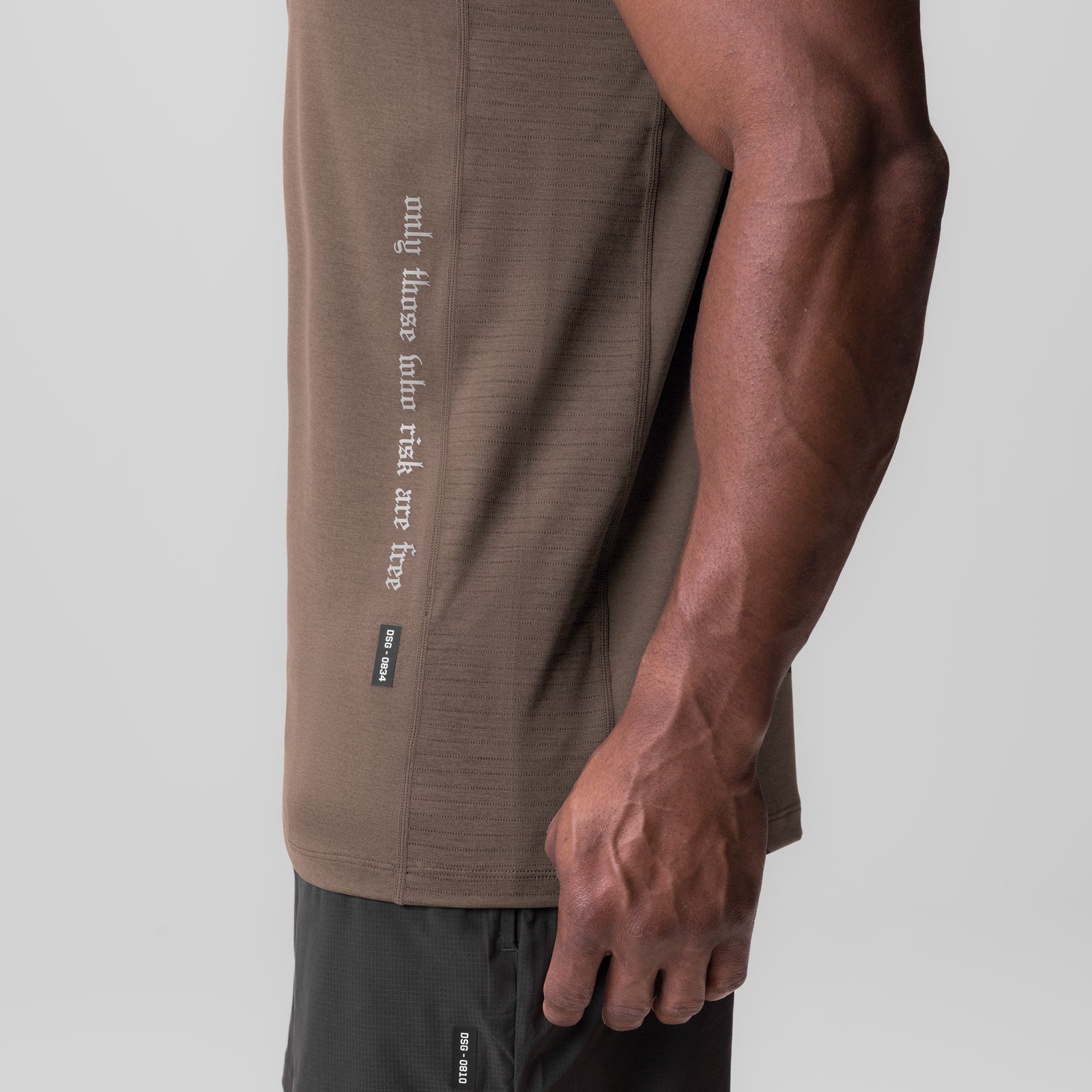 0834. 3D-Lite® 2.0 Training Singlet in deep taupe worn by model, side view