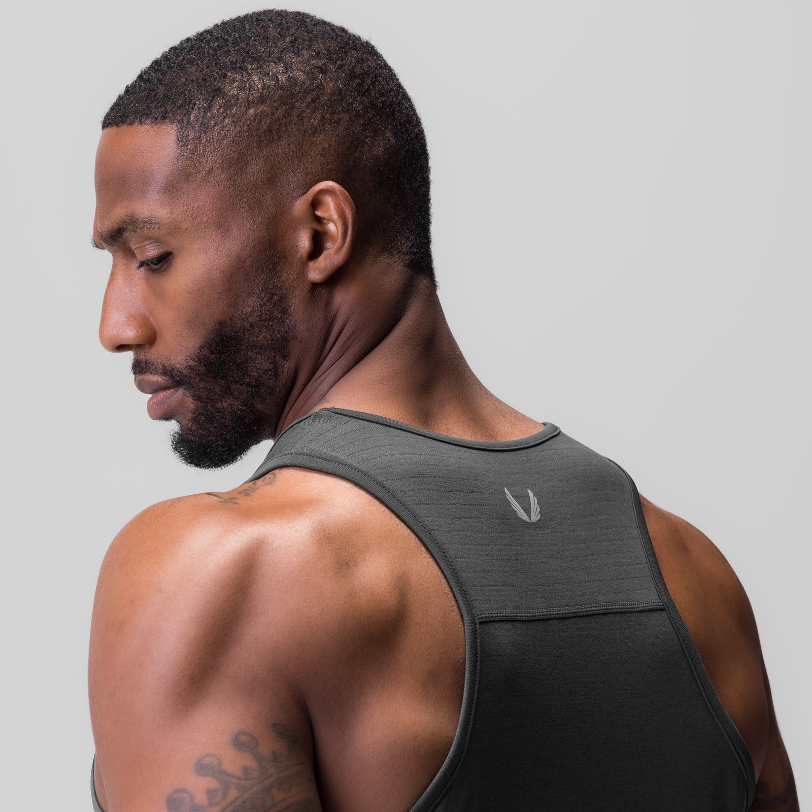 3D-Lite® 2.0 Training Singlet in space grey, worn by model in profile view