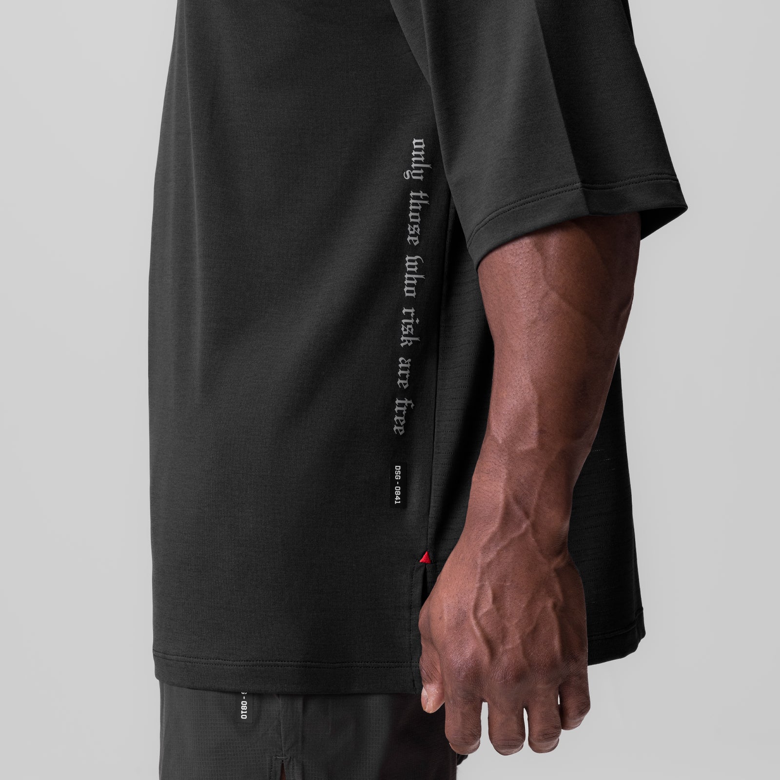 Black 3D-Lite 2.0 3/4-sleeve oversized tee worn by model, side view showing vertical text graphic