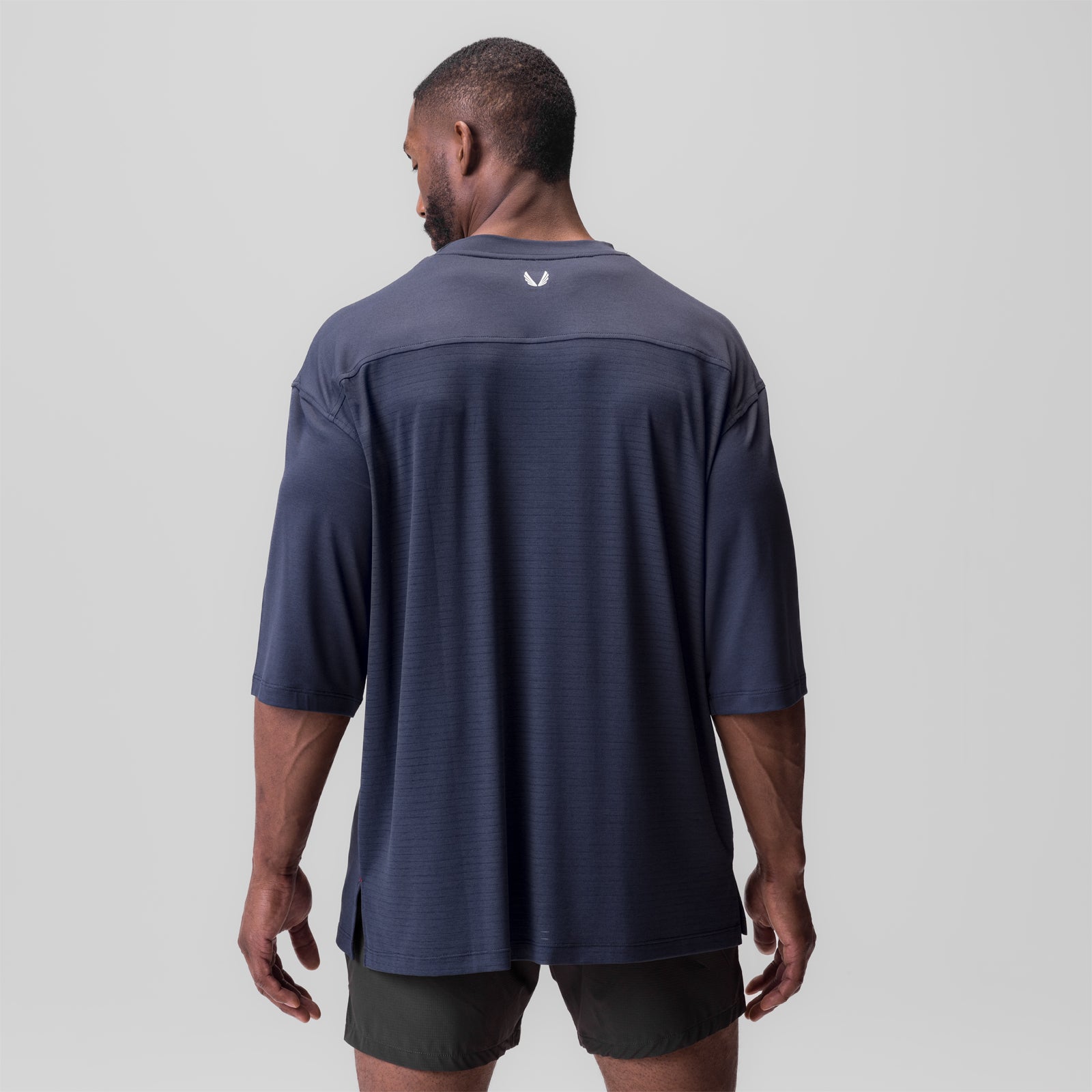 Navy 3D-Lite 2.0 3/4-sleeve oversized tee on model, back view