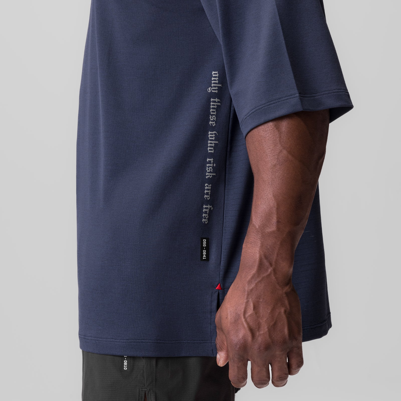 Navy 3D-Lite 2.0 3/4-sleeve oversized tee worn by model, side view showing text detail