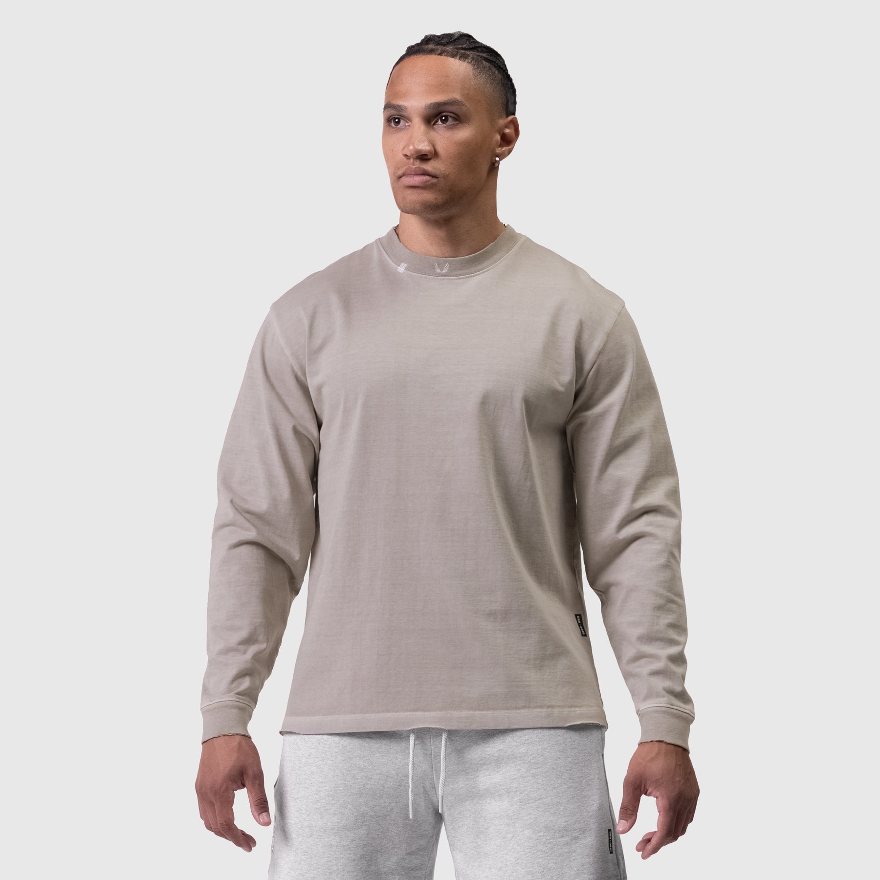Tech Essential Relaxed Long Sleeve in Faded Chai, worn by model, front view