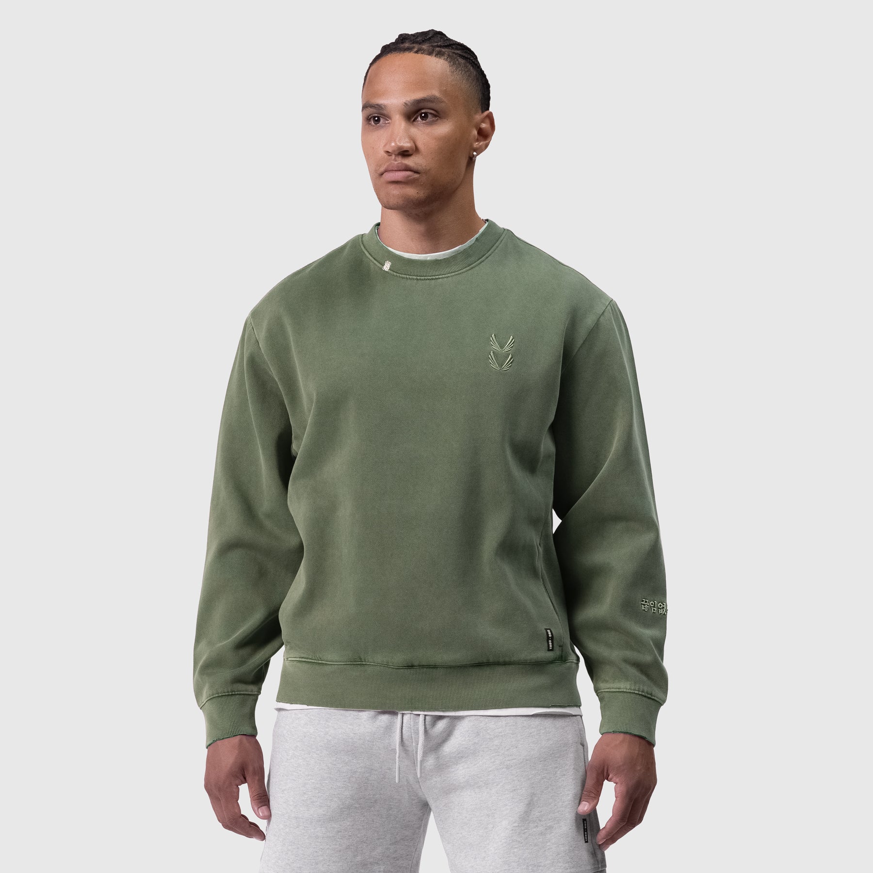Tech Essential Distressed Crewneck in Faded Olive, worn by model, front view