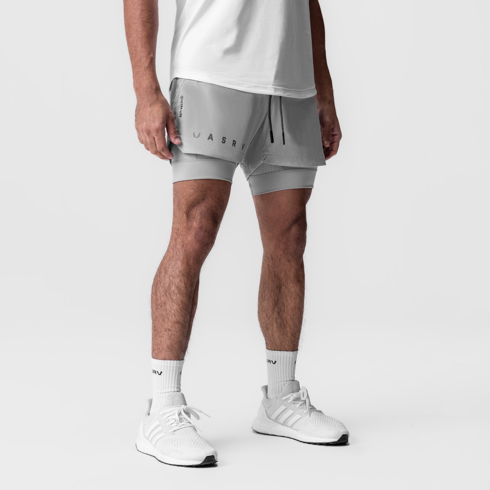 Tetra-Lite 5" Liner Short in slate grey, worn with white sneakers and socks, front view