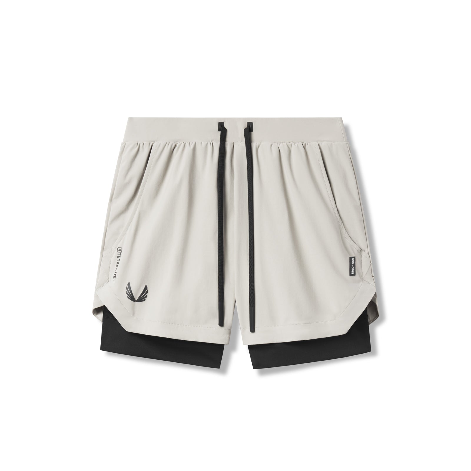 Flatlay of Tetra-Lite 5" Liner Shorts in Stone and Black, front view