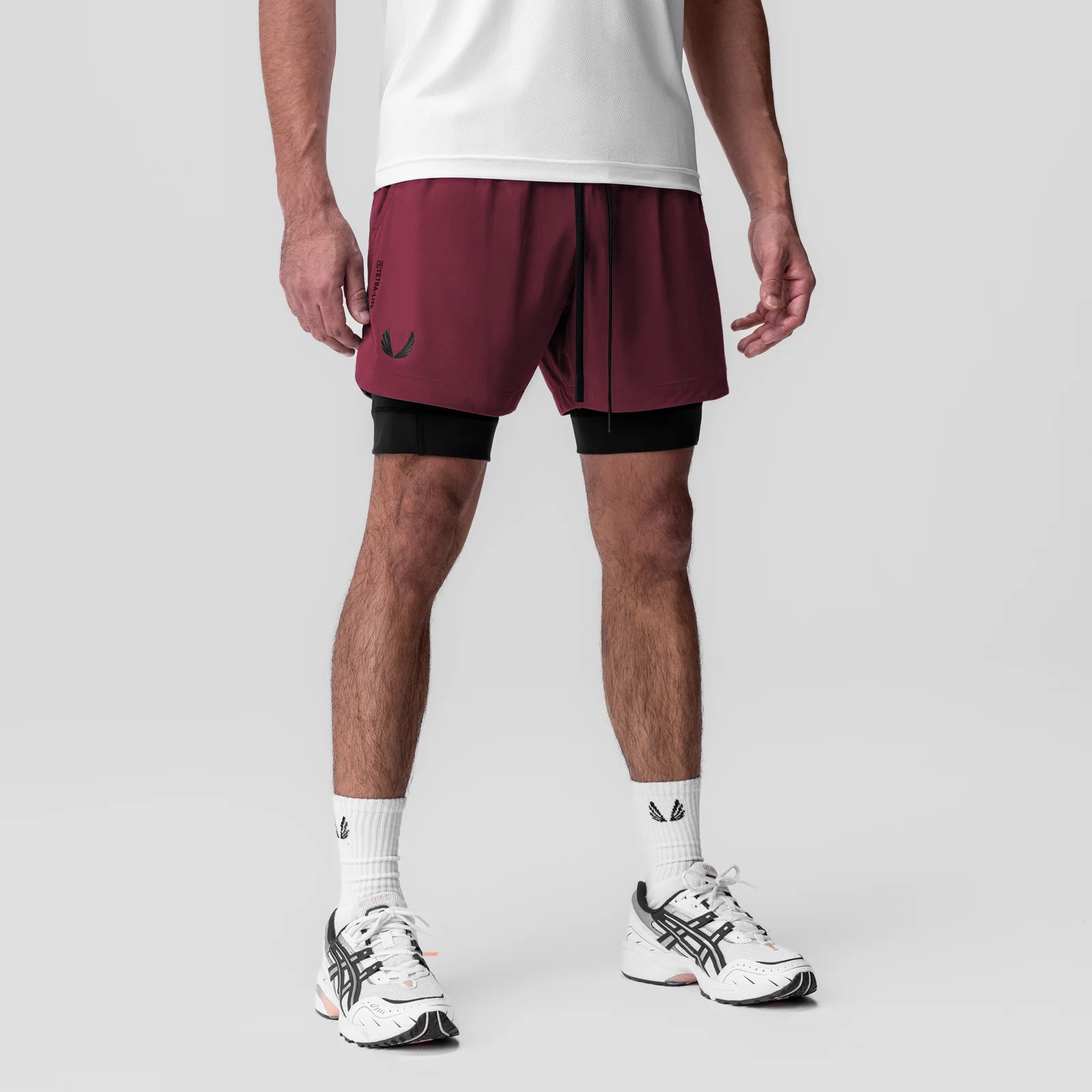 Tetra-Lite 5" Liner Short in Crimson and Black, worn with white socks and sneakers, front view