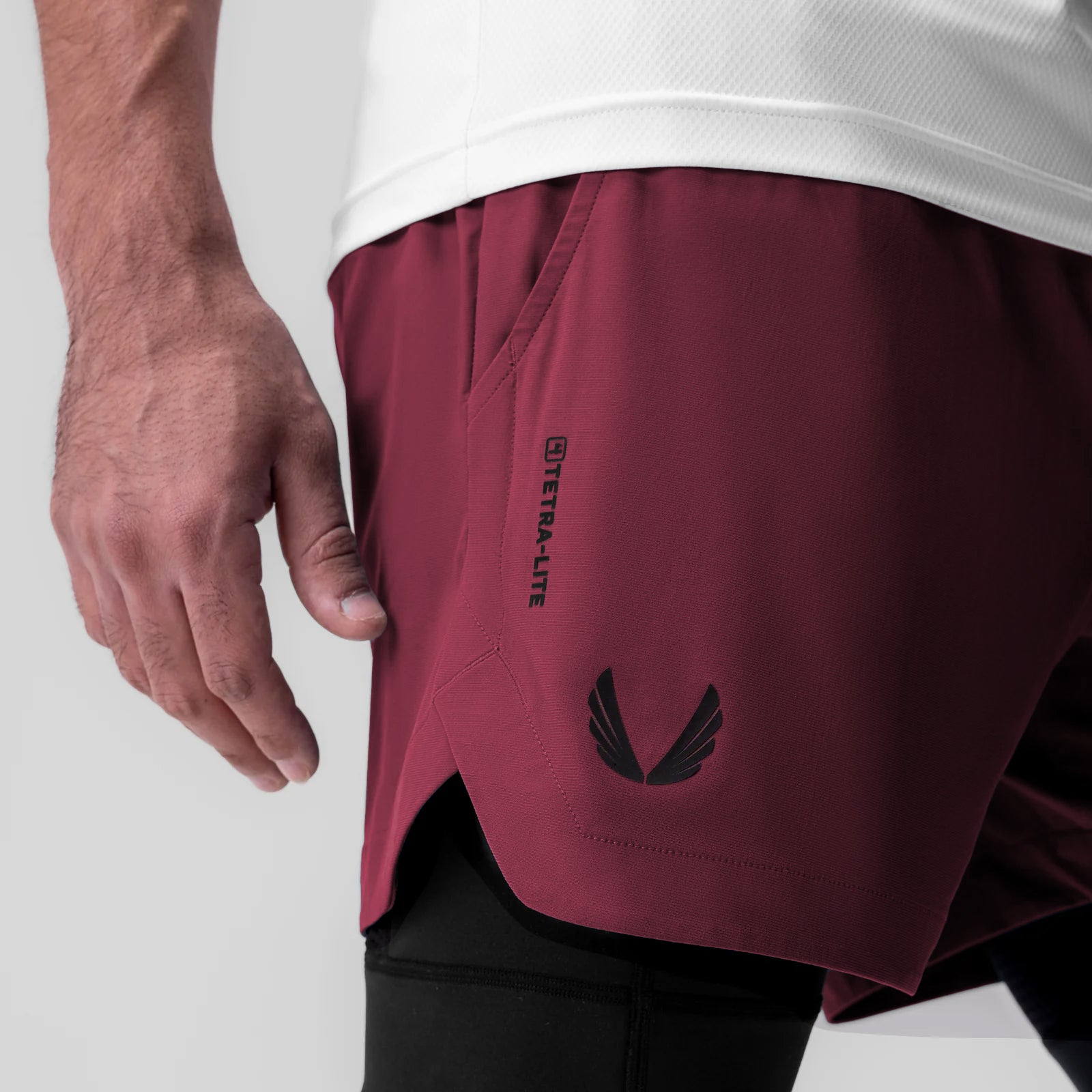 Tetra-Lite 5" Liner Short in Crimson with Wings logo, worn by model, side view