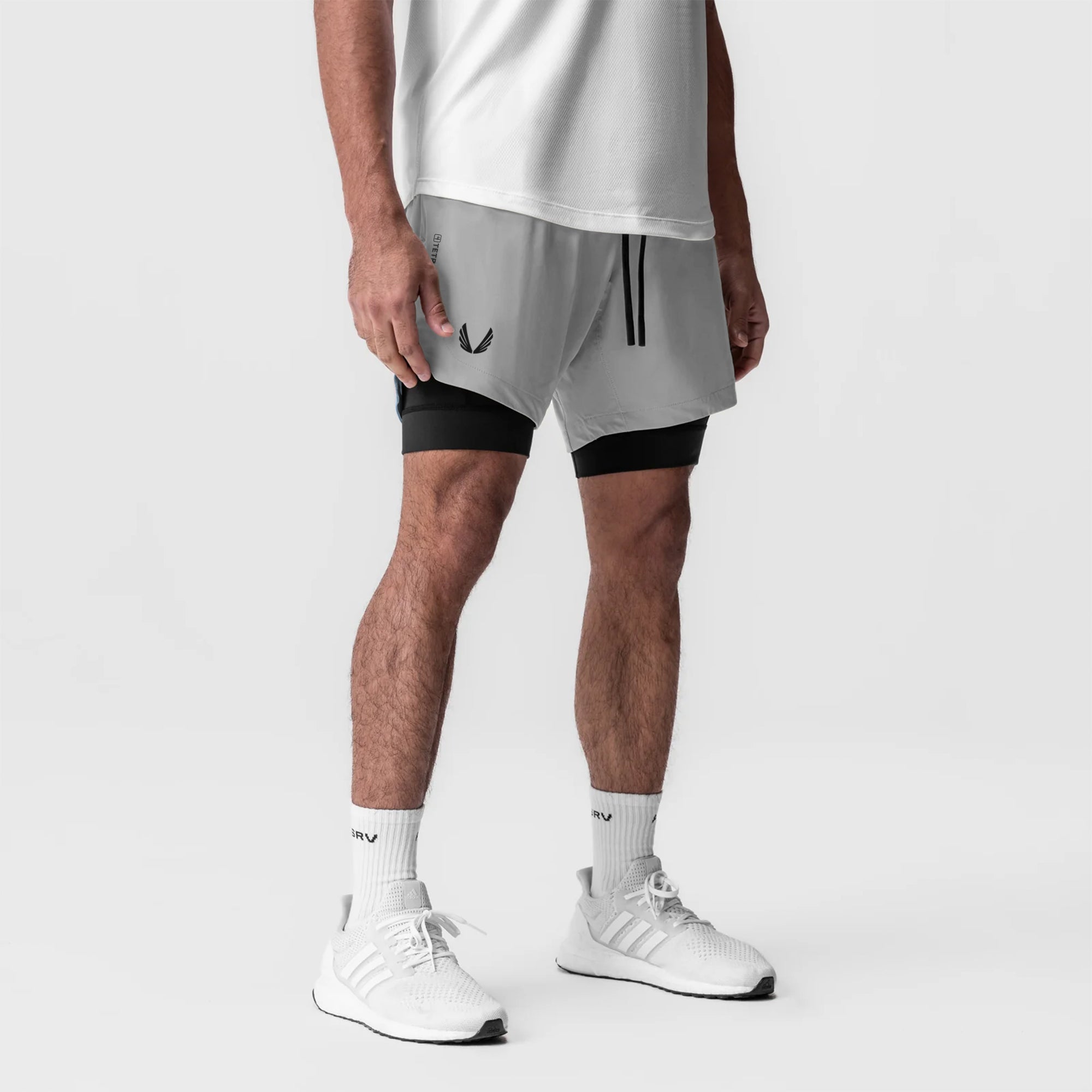 Tetra-Lite 7" Liner Short in Slate Grey and Black, worn with white socks and sneakers