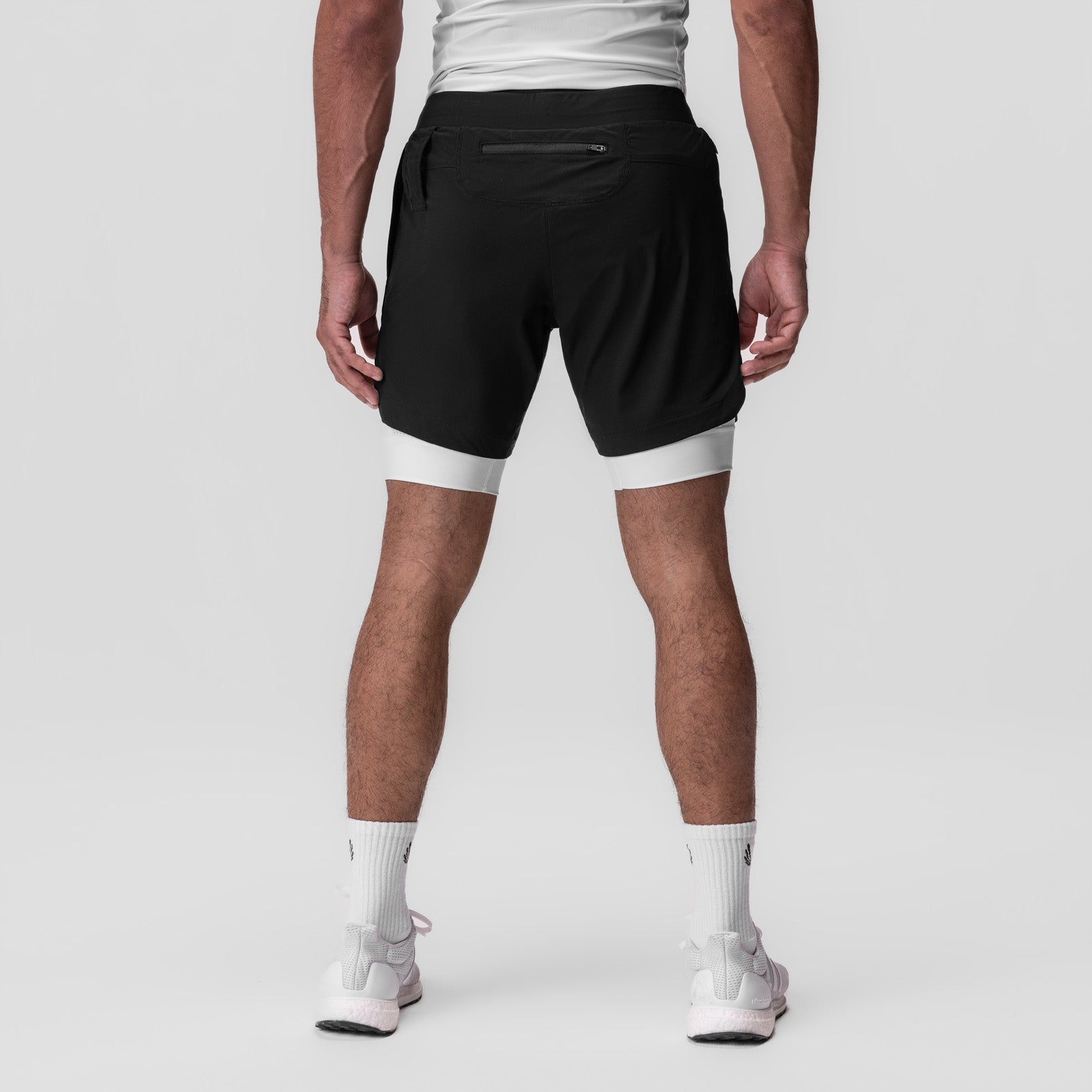 Tetra-Lite 7" Liner Short in black with white liner, back view on model