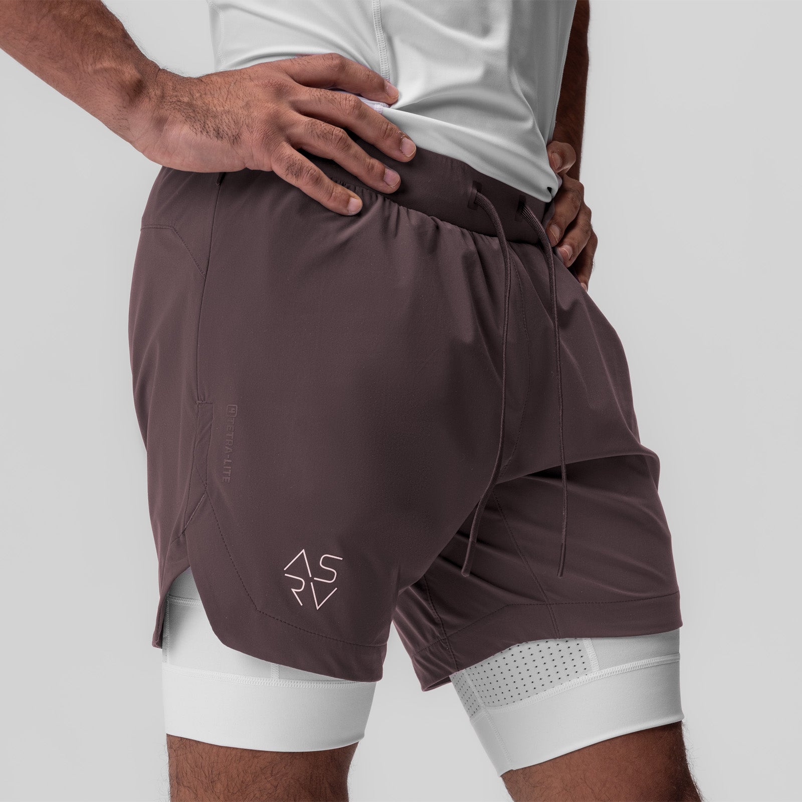 Tetra-Lite 7" Liner Short in Nightshade/White, modeled from side waist view
