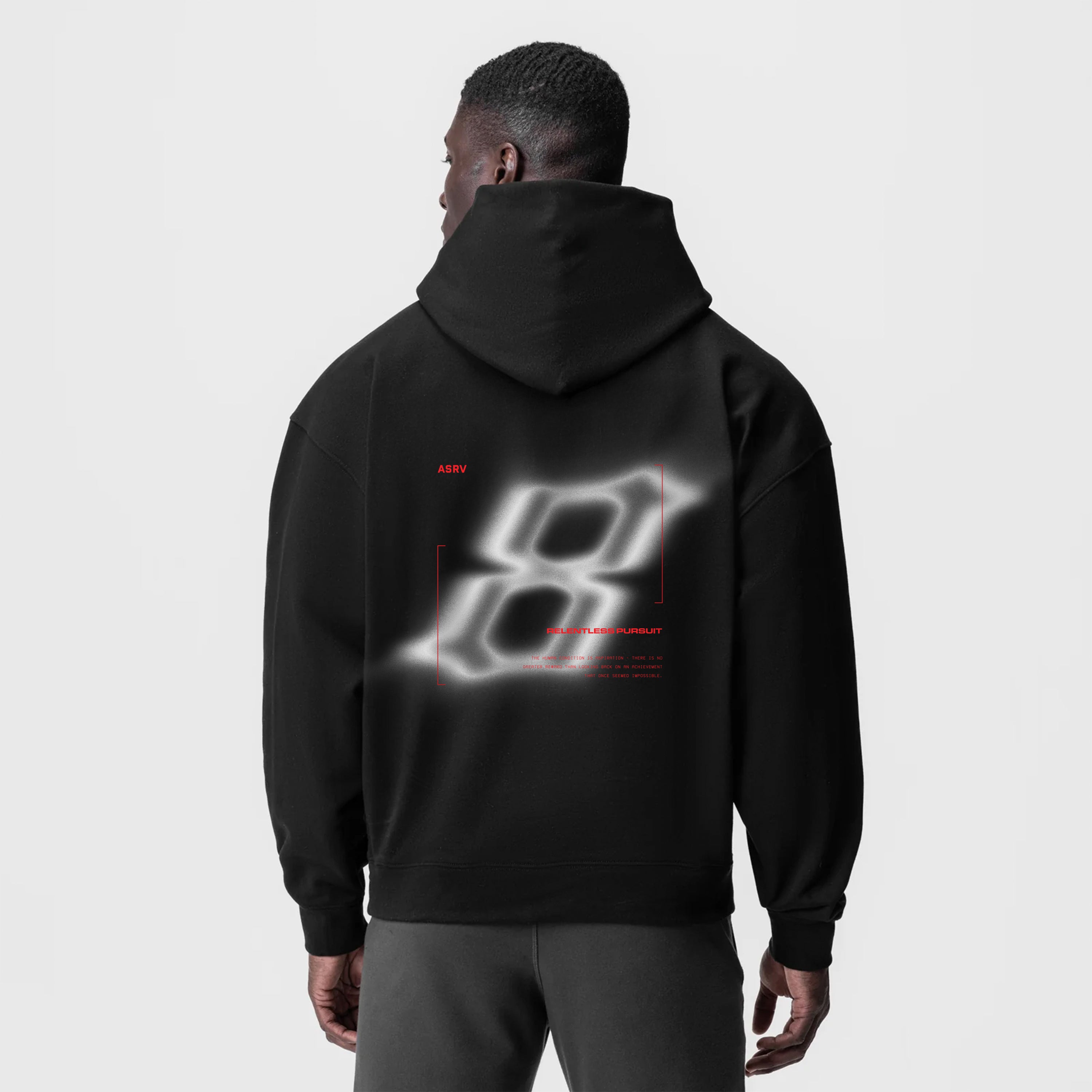 Tech-Terry Zip Pocket Hoodie in black worn by model, back view