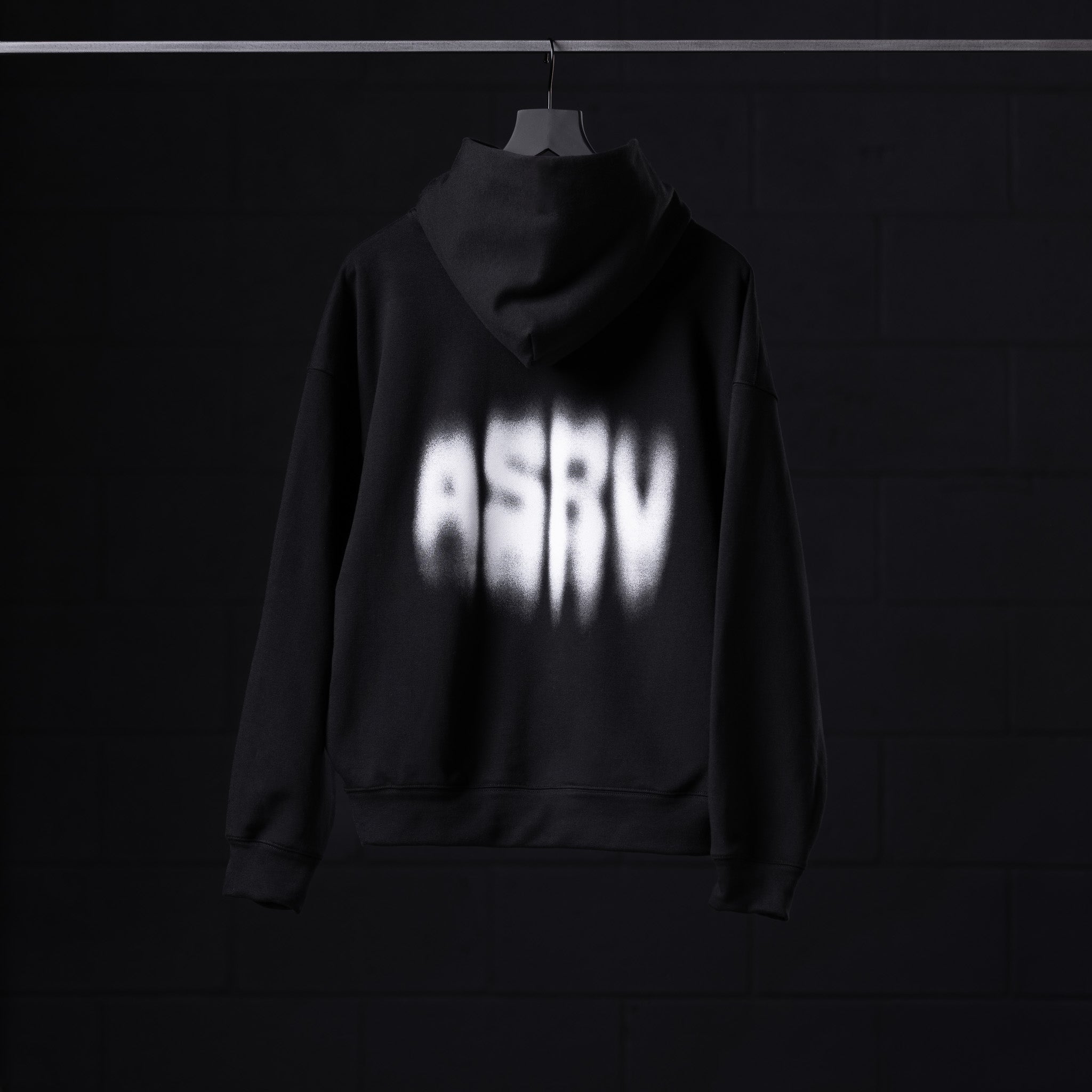 Flatlay Tech-Terry Zip Pocket Hoodie in black with Motion Blur graphic, front view