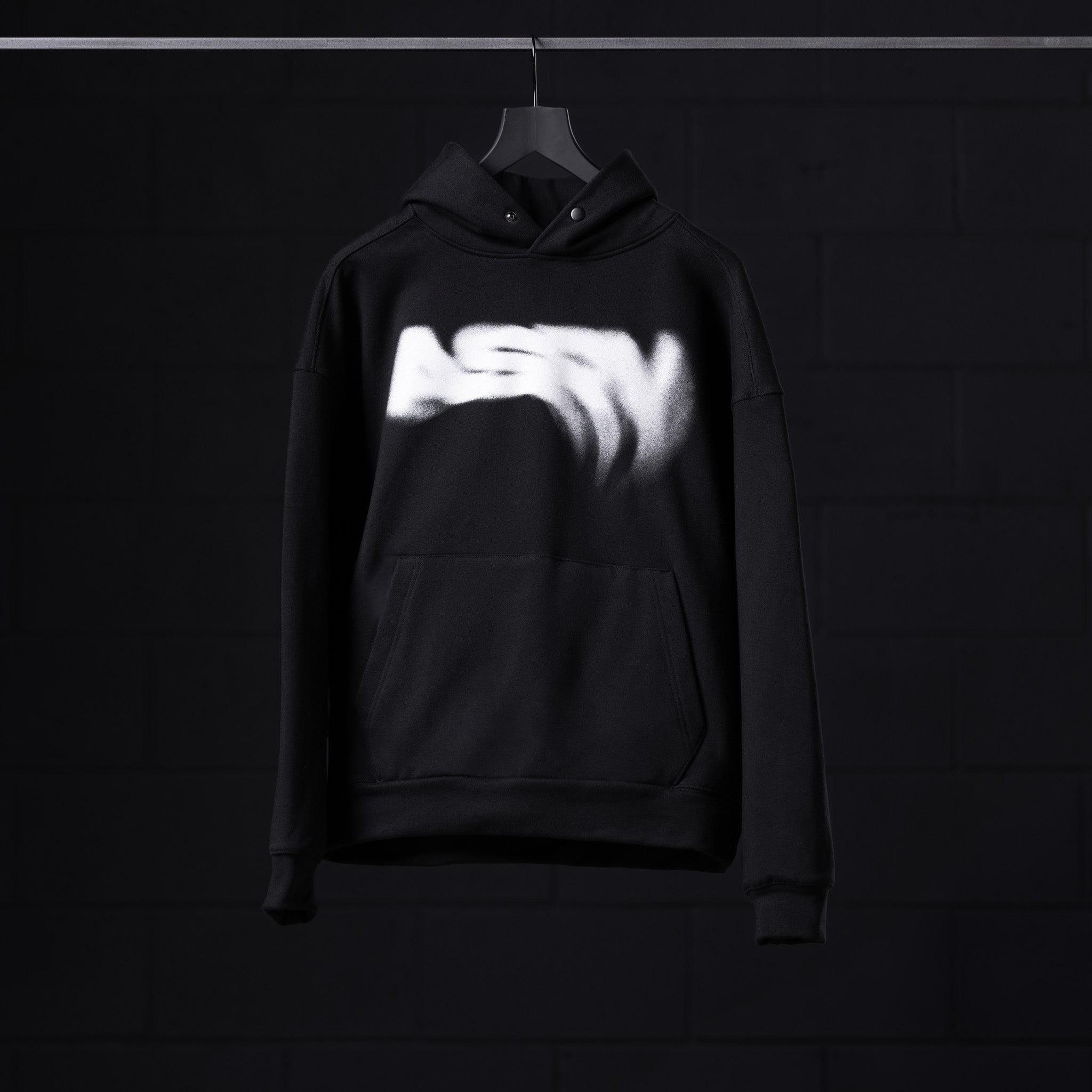 Flatlay Tech-Terry Zip Pocket Hoodie in black with white graphic design, front view