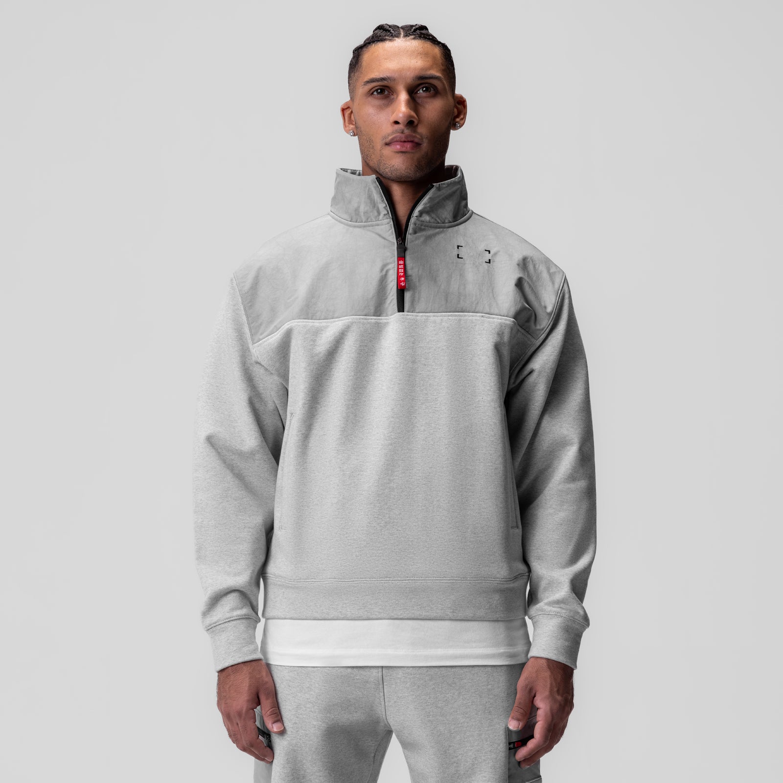 Tech-Terry Paneled Quarter Zip in Heather Grey, worn by model, front view