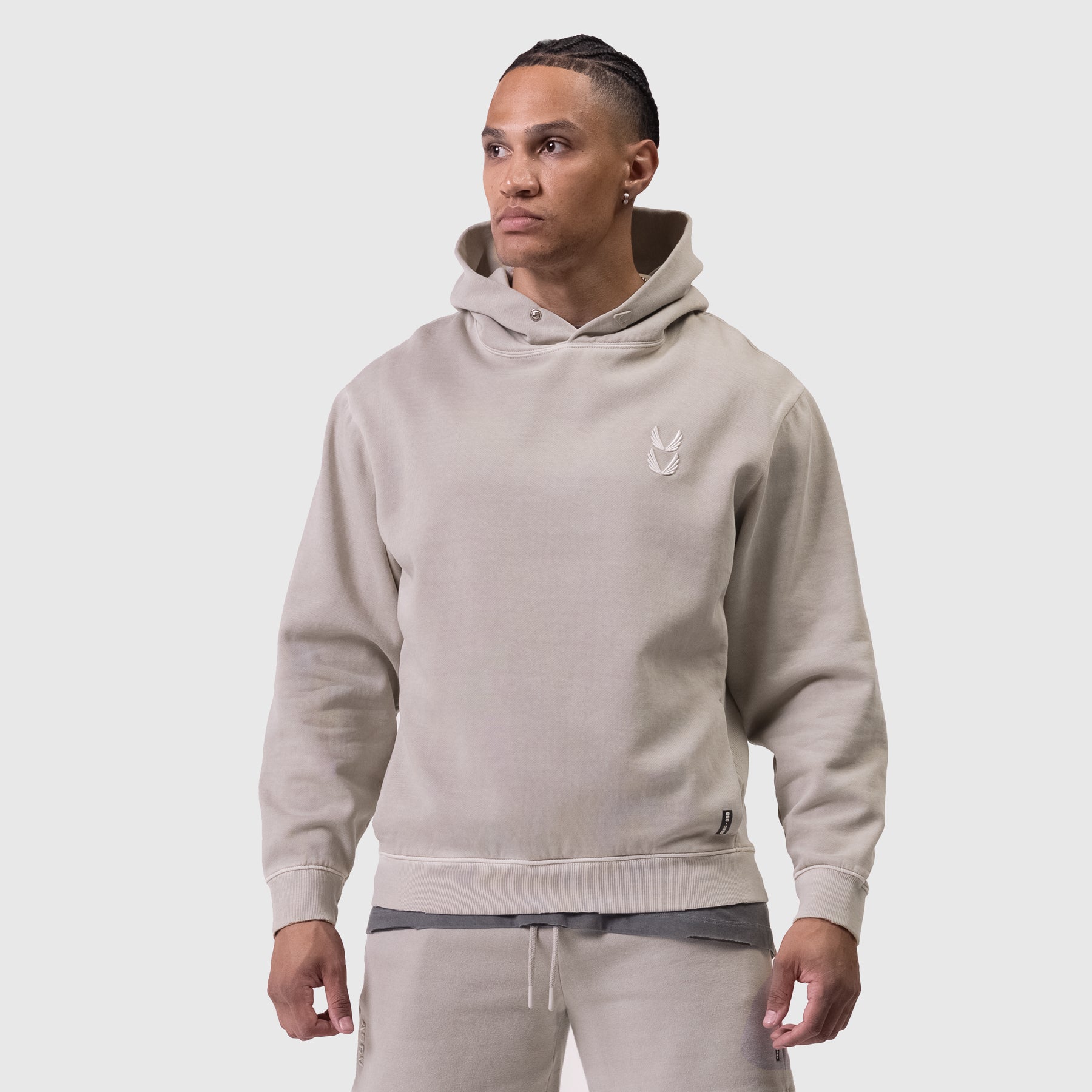 Tech Essential Distressed Hoodie in Faded Chai worn by model, front view