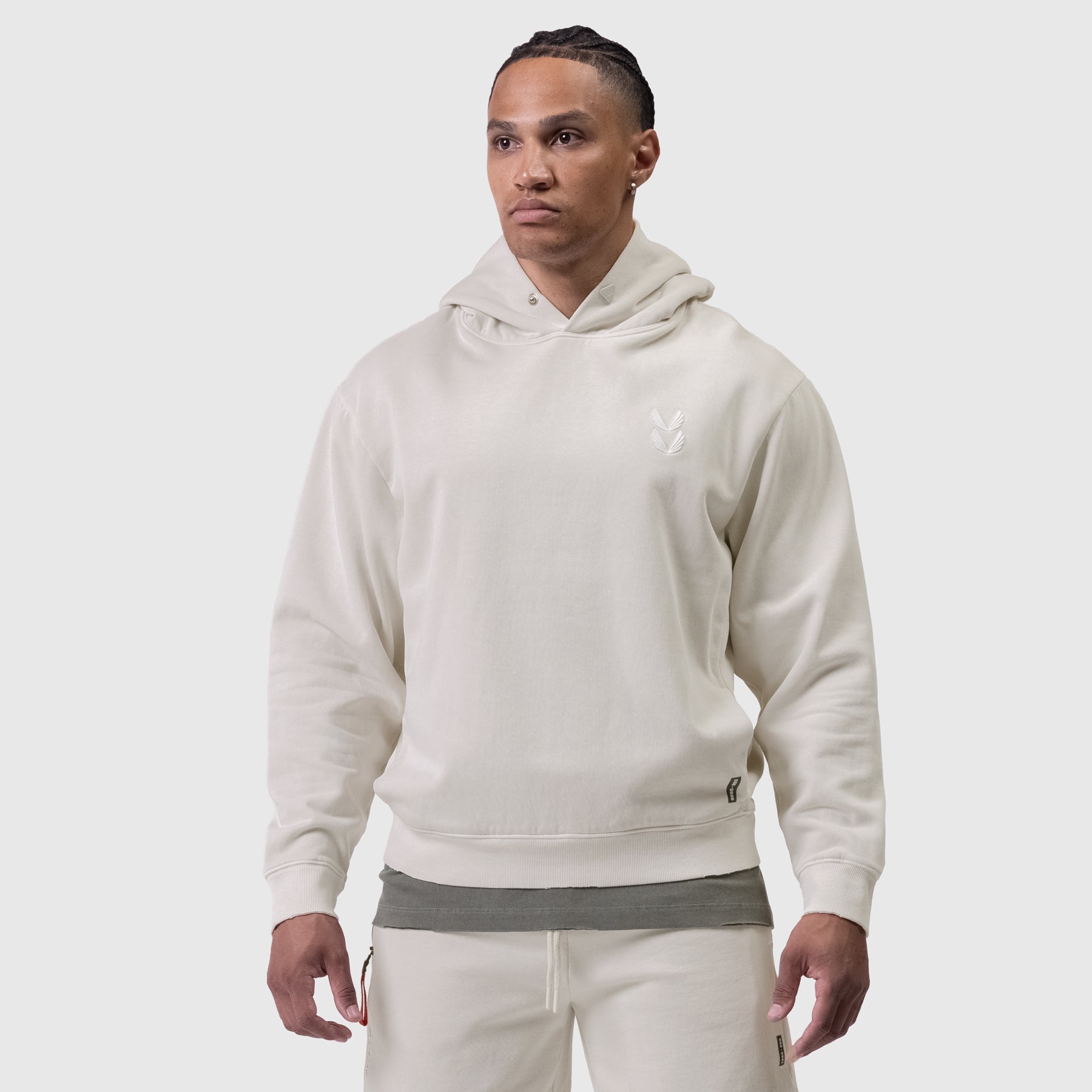 Tech Essential Distressed Hoodie in Faded Stone worn by model, front view