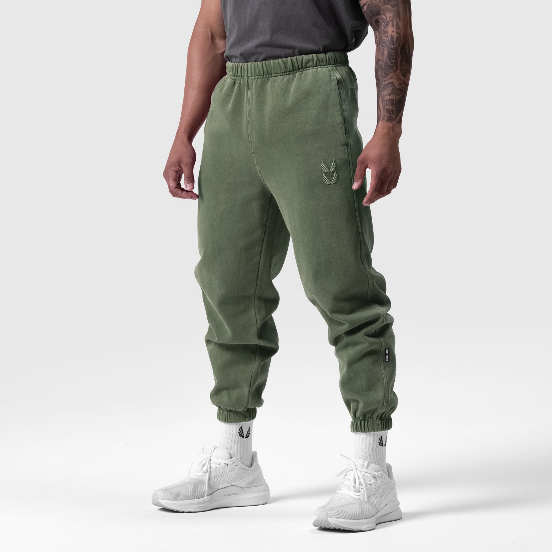 Tech Essential™ Sweats in Faded Olive worn by model, full-length back view