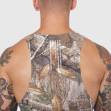 Laser-Vent Singlet Tank in Realtree Edge camo, back view on male model with visible tattoos
