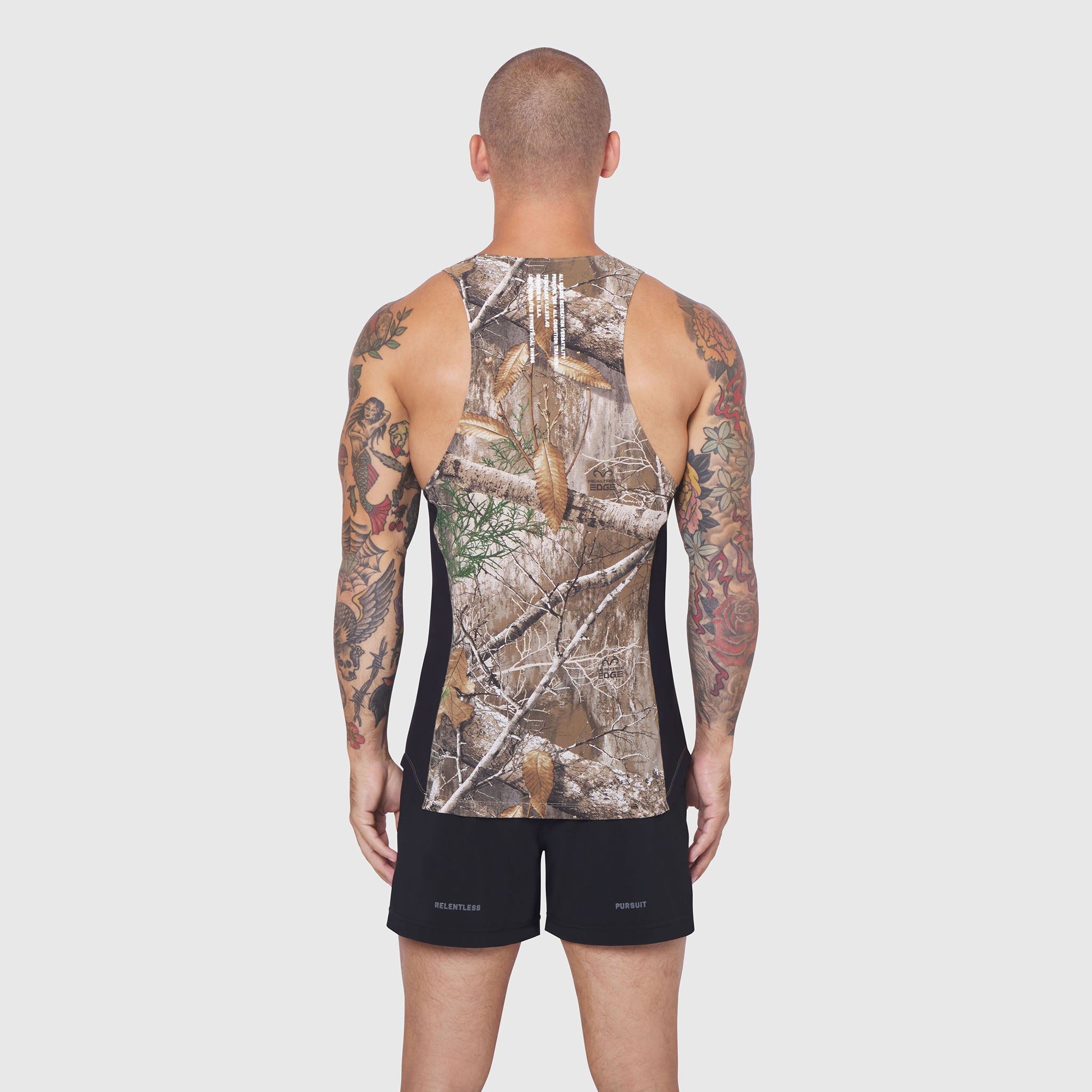 Laser-Vent Singlet Tank in Realtree Edge camo, back view on model