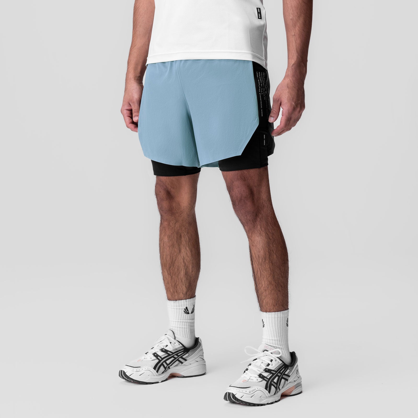 Aerotex™ Hybrid Liner Short in light sky blue and black, worn by model from behind