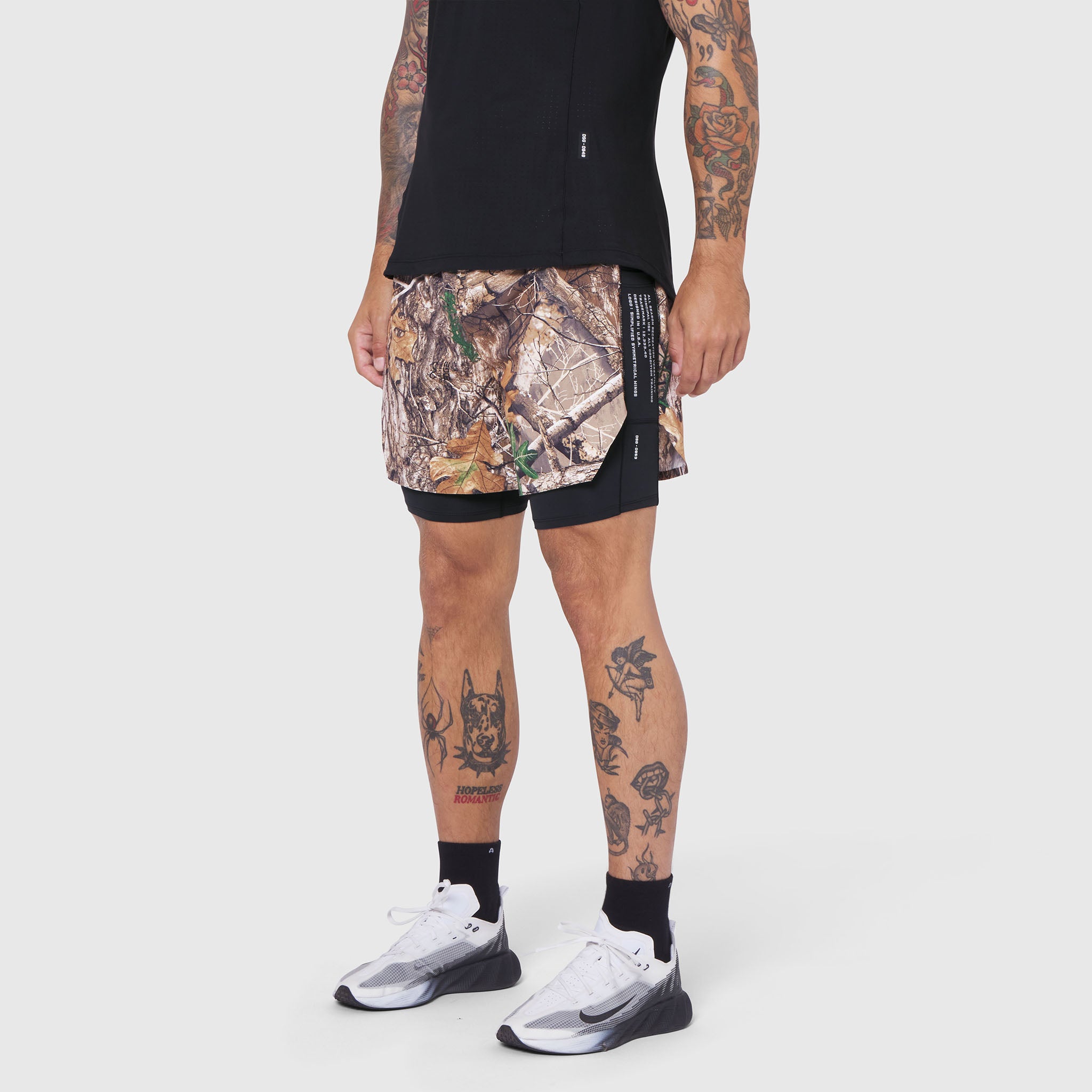 Aerotex™ Hybrid Liner Short in Realtree® Edge camo with black liner shorts, front view on model