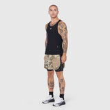 Aerotex Hybrid Liner Short in camo and black, worn by model with full-length front view