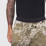 Aerotex Hybrid Liner Short in camo print, worn by model showing side view
