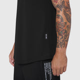 Black Laser-Vent Tank Top worn by model showing side view with tattoo visible on arm