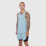 Laser-Vent™ Tank Top in Light Sky worn by male model with matching shorts, front view