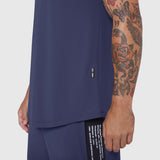 Laser-Vent™ Tank Top in navy worn by model, side view showing fit and branding details