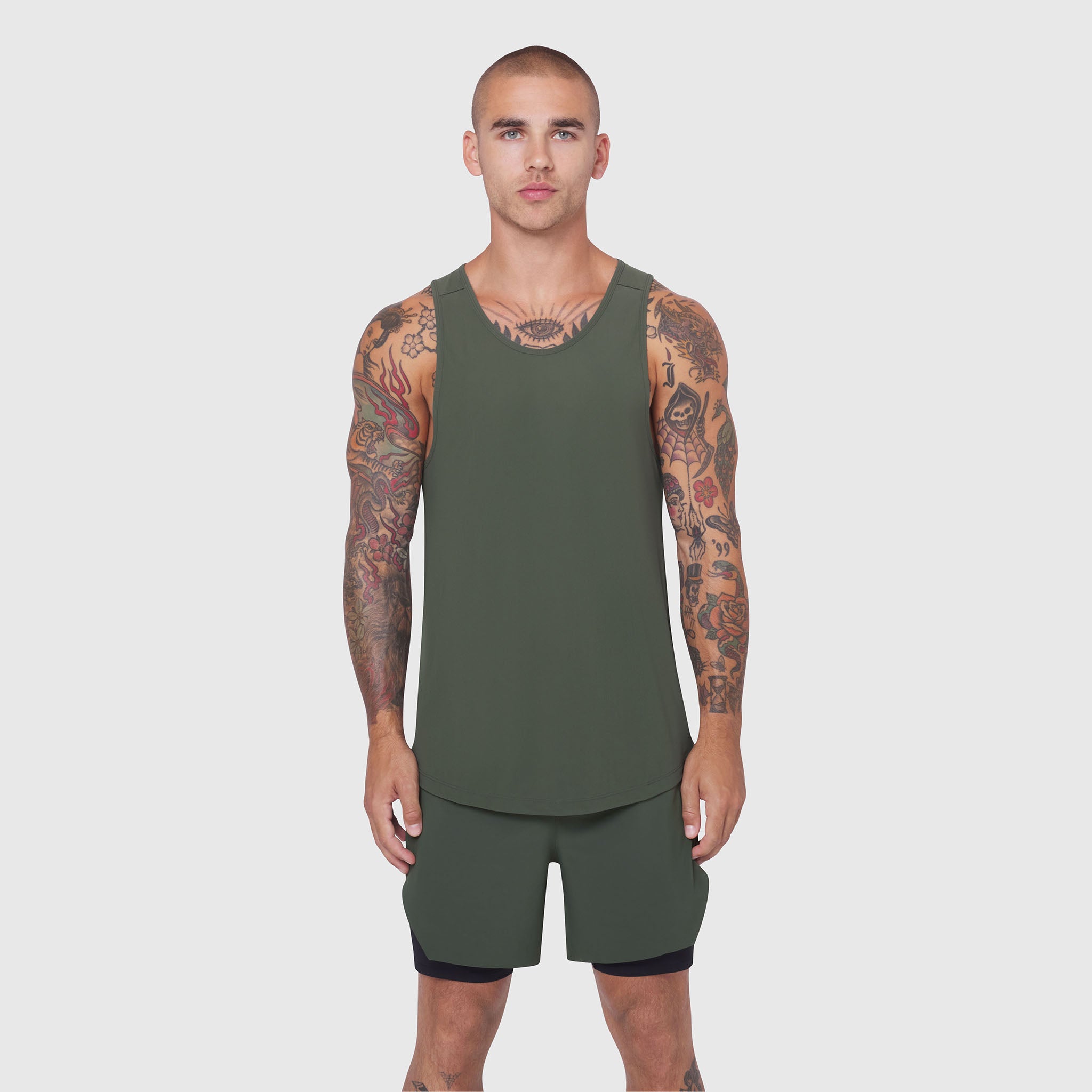 Laser-Vent™ Tank Top in olive worn with matching shorts, front view on model