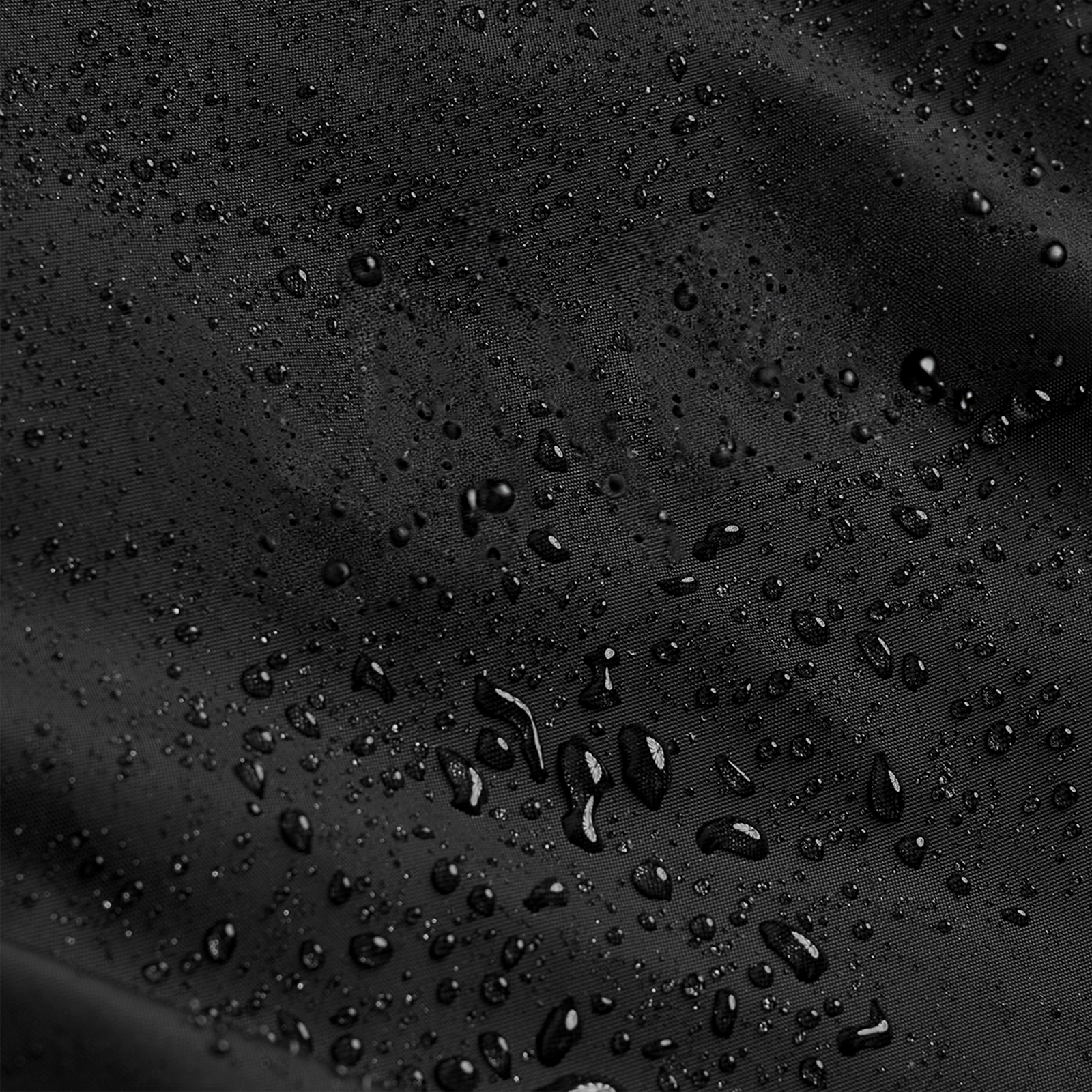 Flatlay Large Waterproof Crossbody Bag in black, water droplets detail